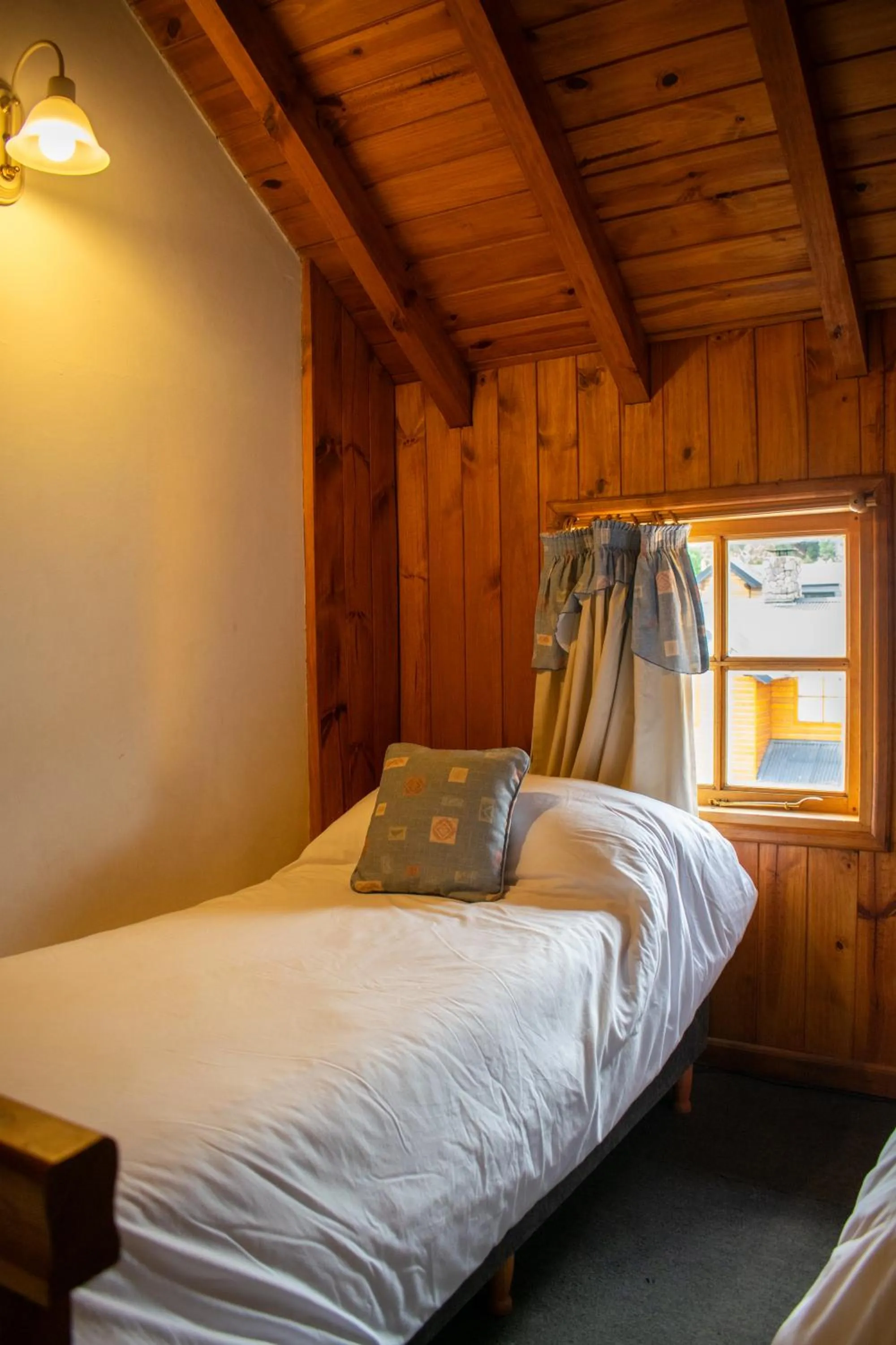 Bed in Hosteria y Cabañas Posada Quinen