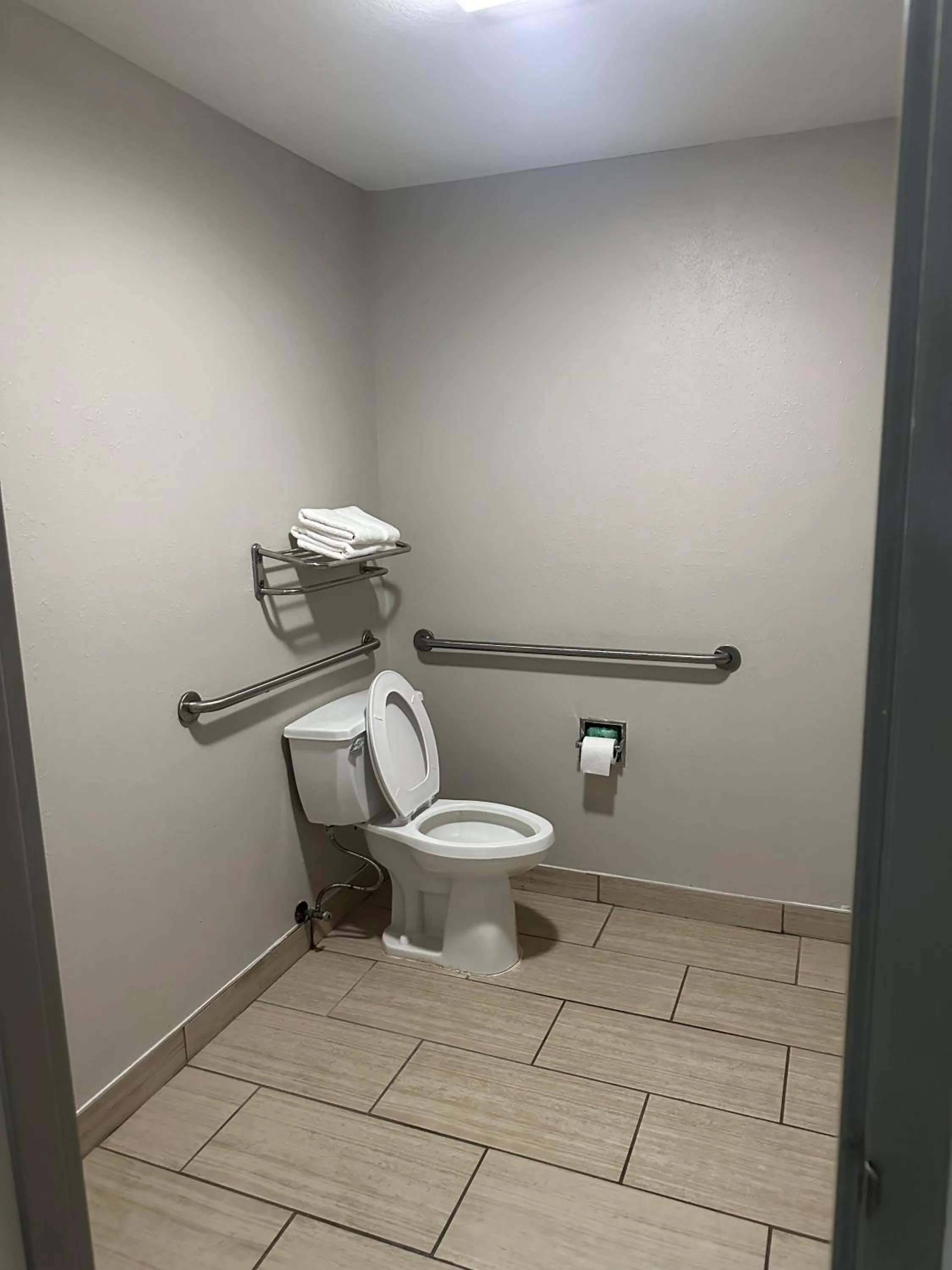 Bathroom in Days Inn & Suites by Wyndham Opelousas