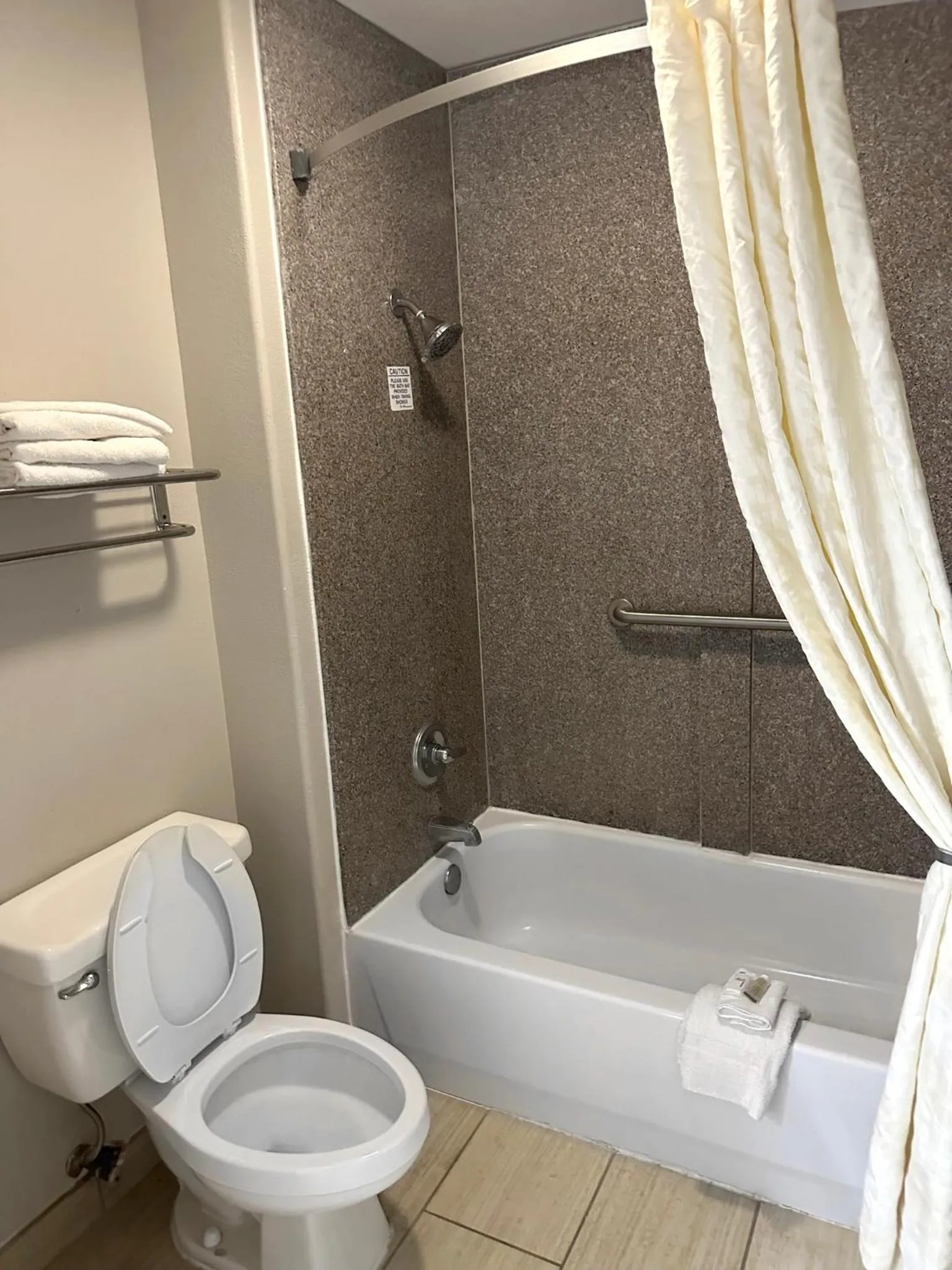 Bathroom in Days Inn & Suites by Wyndham Opelousas