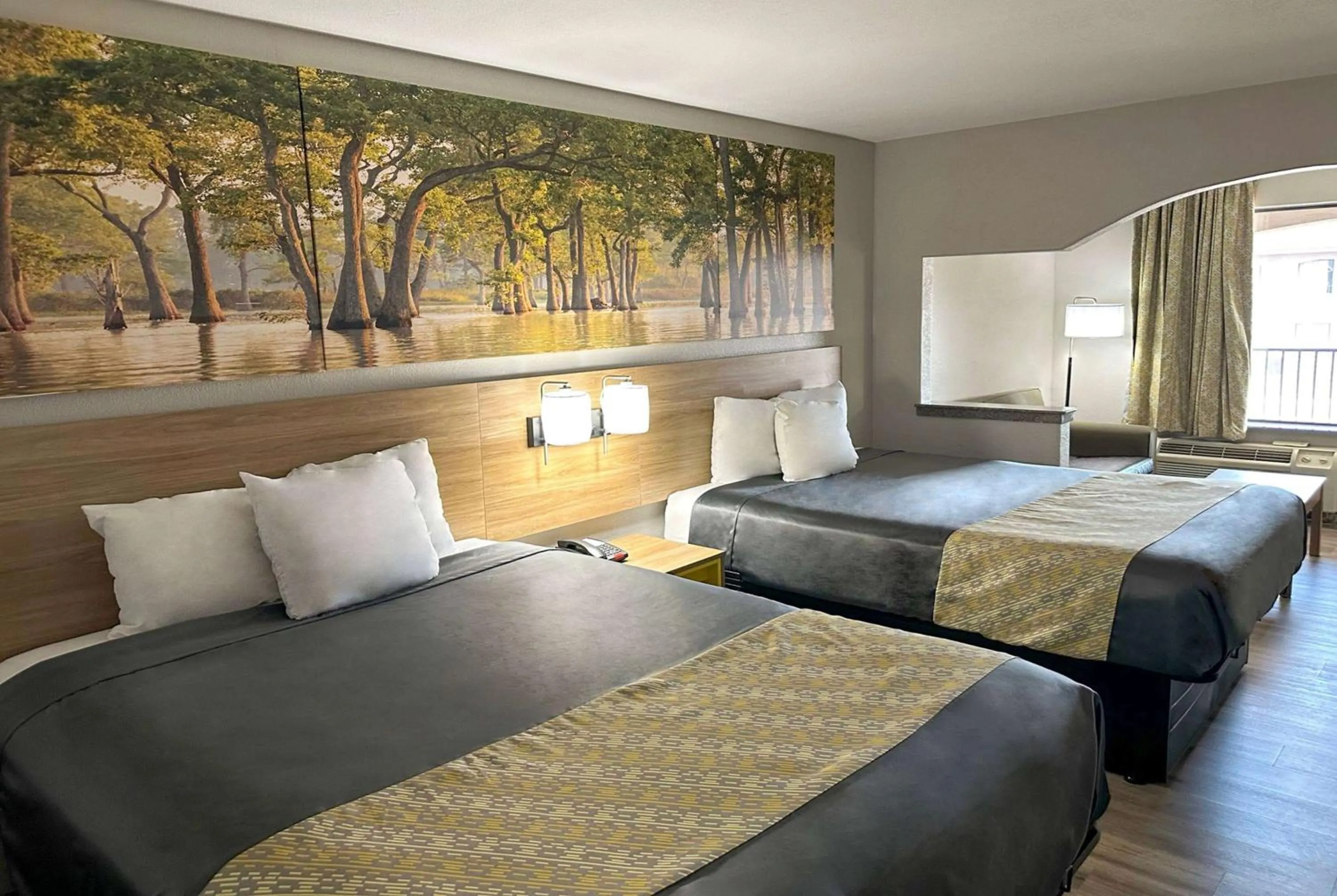 Photo of the whole room, Bed in Days Inn & Suites by Wyndham Opelousas