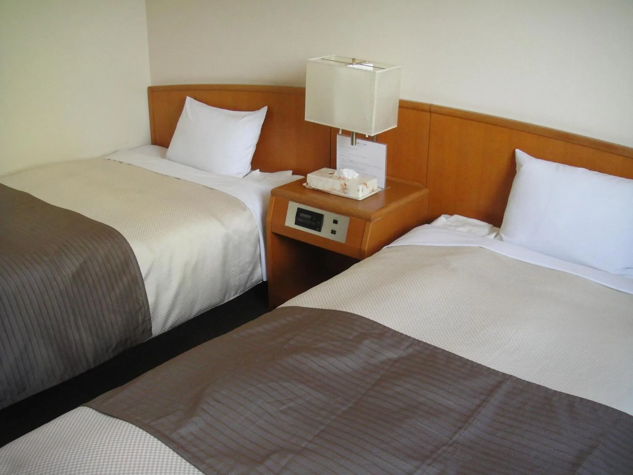 Photo of the whole room, Bed in Hotel New Shizuoka