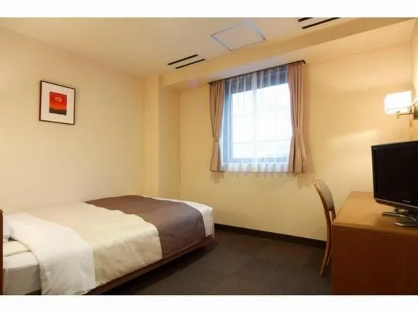 Photo of the whole room, Bed in Hotel New Shizuoka