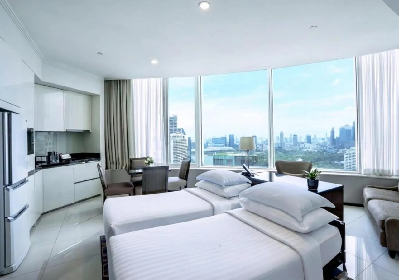 Bed in Grande Centre Point Hotel Terminal21