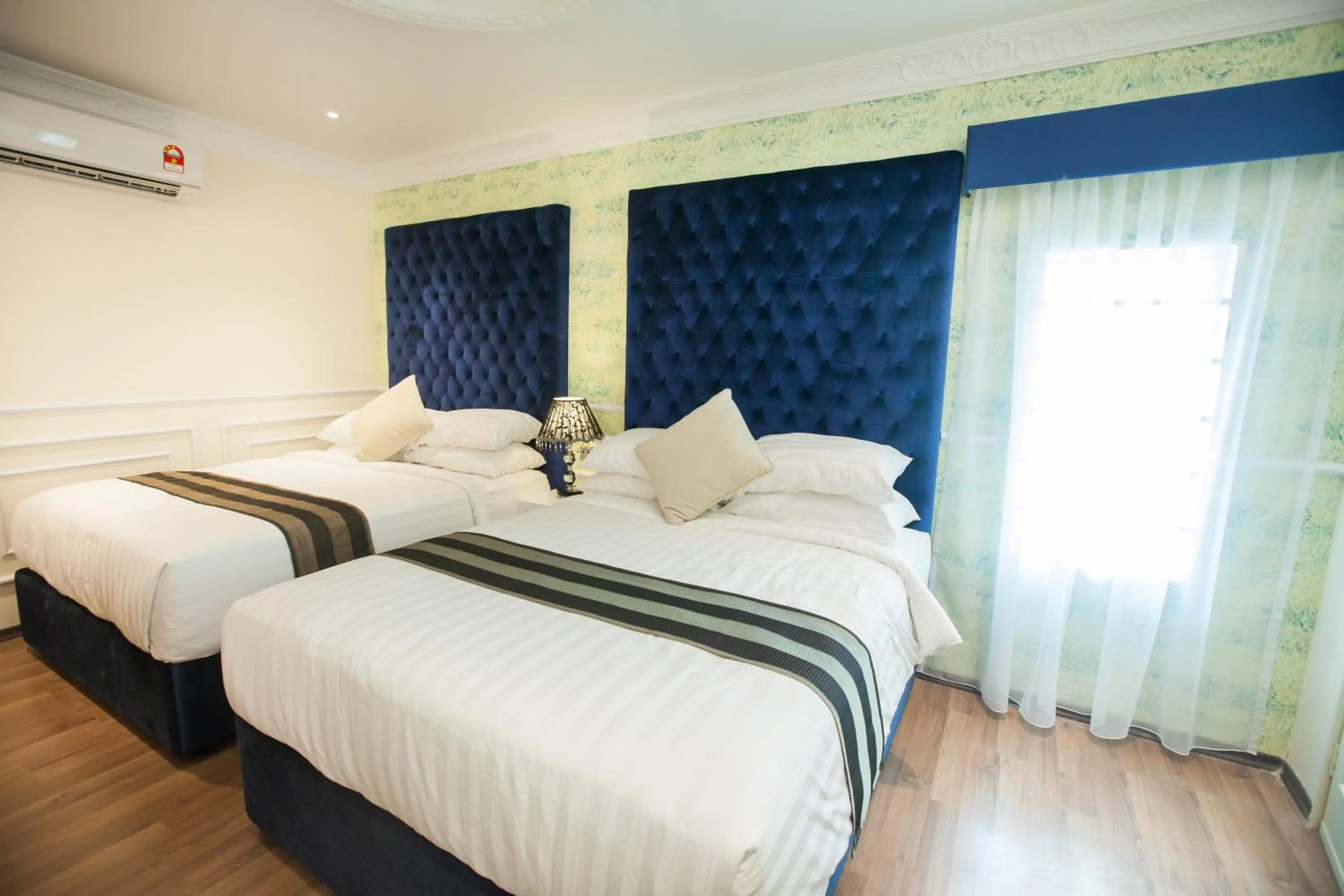 Photo of the whole room, Bed in Apple Heritage Hotel