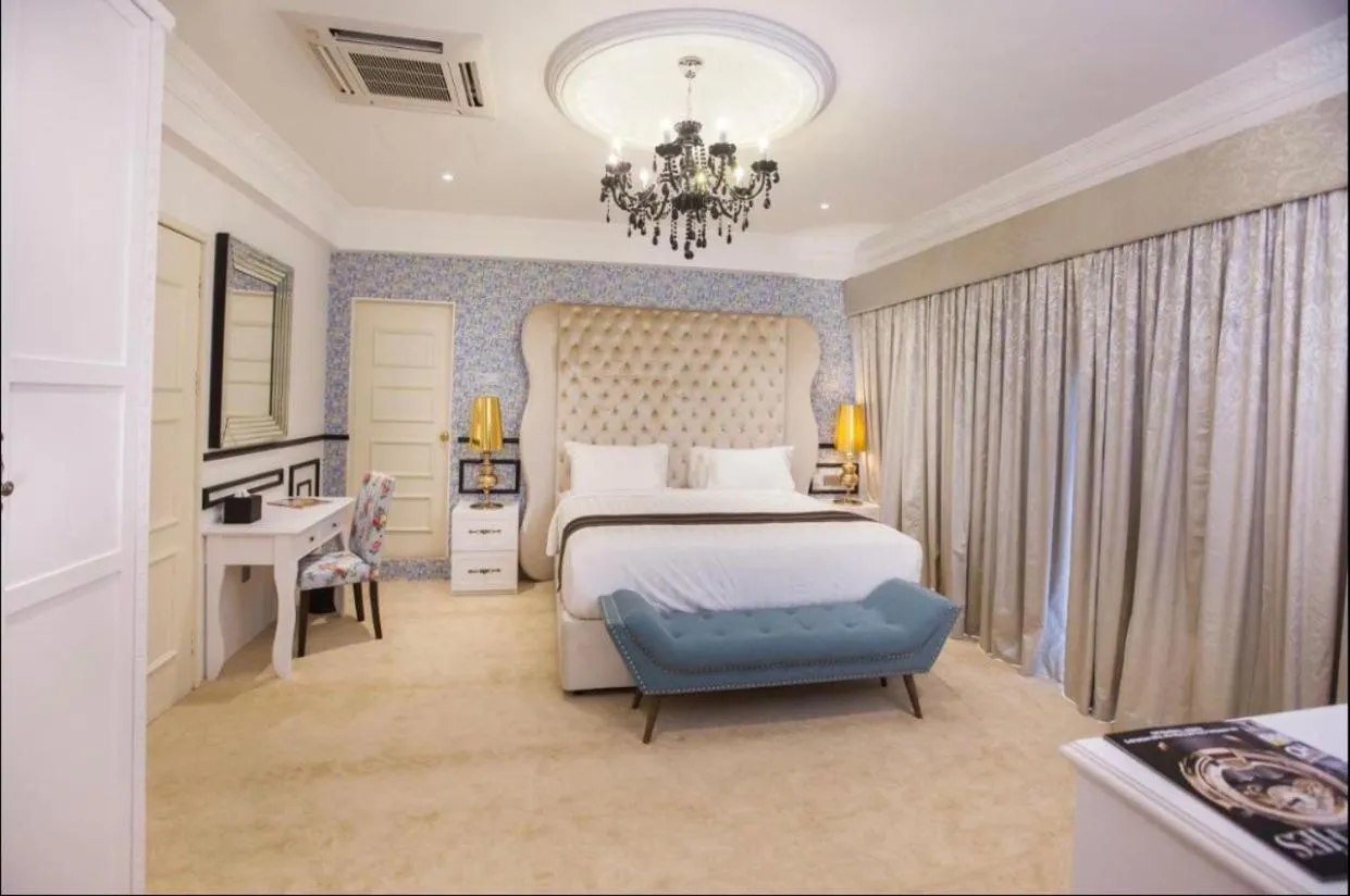 Bed in Apple Heritage Hotel