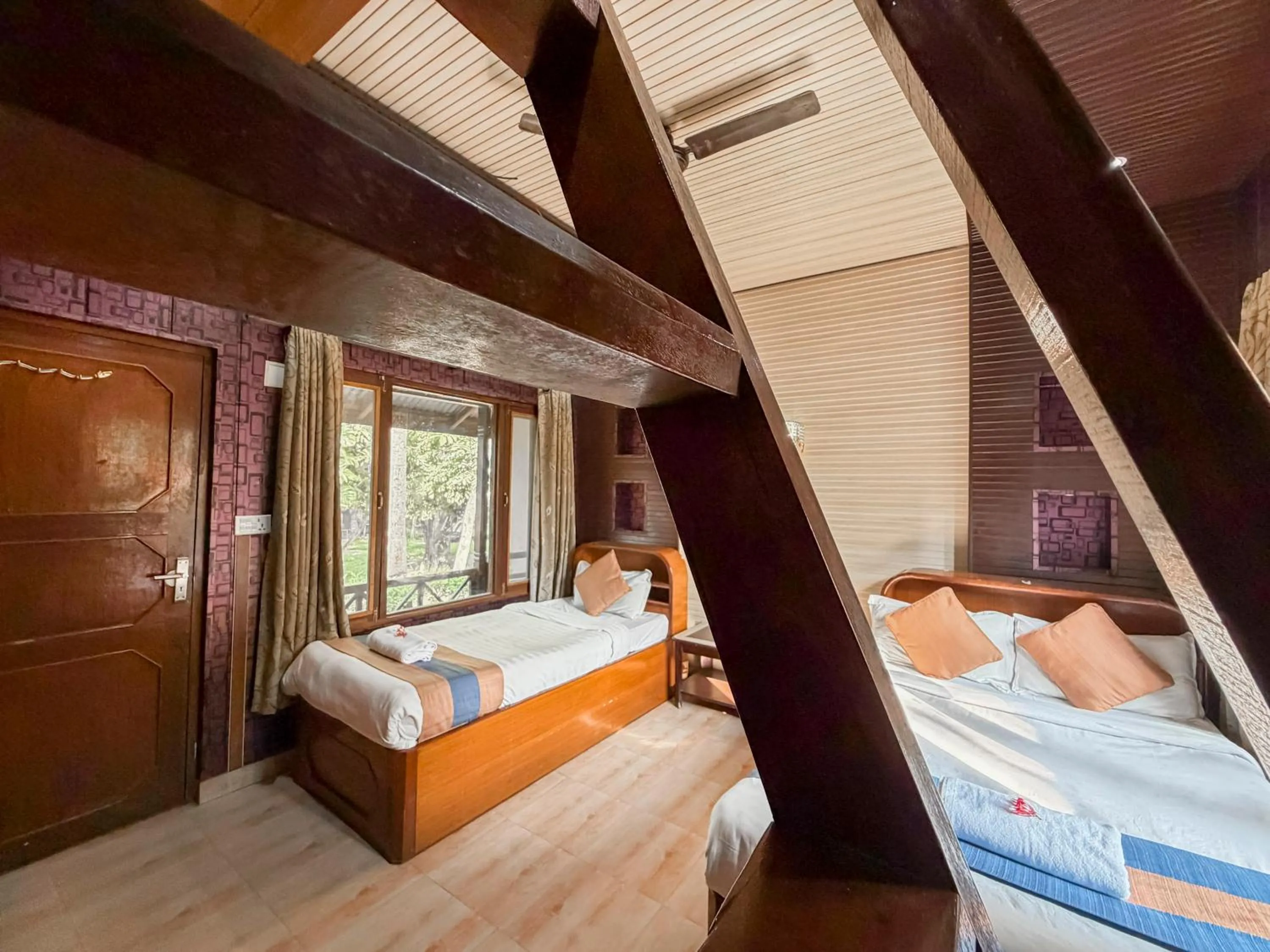 Coffee/tea facilities, Bed in Chitwan Forest Resort with swimming pool , Chitwan National Park