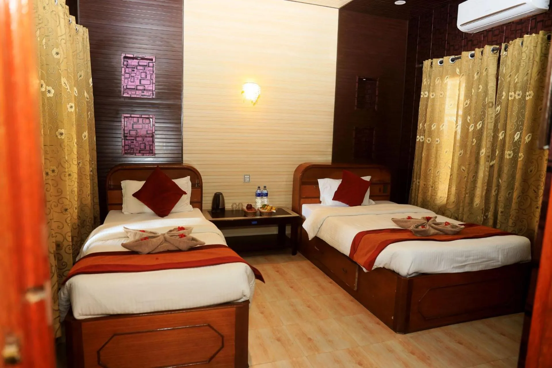 Photo of the whole room, Bed in Chitwan Forest Resort with swimming pool , Chitwan National Park