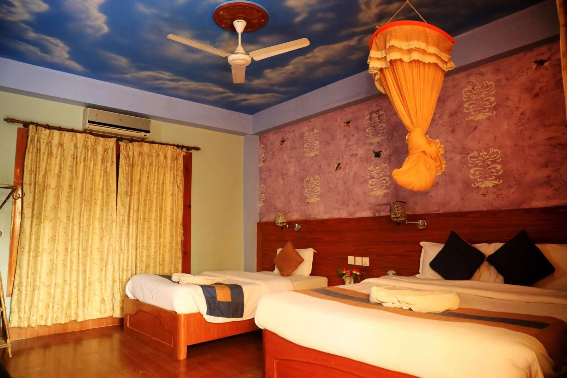 Bed in Chitwan Forest Resort with swimming pool , Chitwan National Park