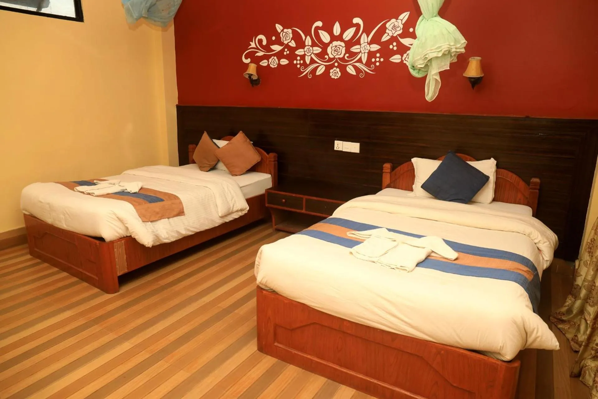 Bed in Chitwan Forest Resort with swimming pool , Chitwan National Park