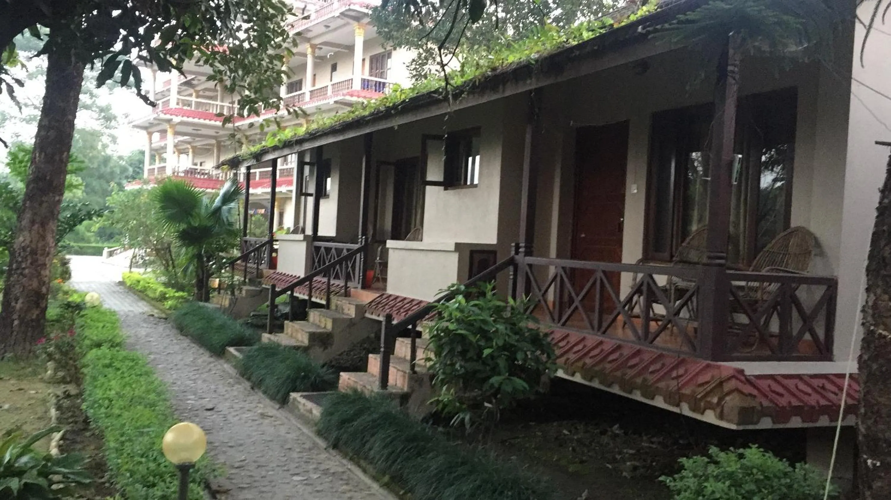 Property building in Chitwan Forest Resort with swimming pool , Chitwan National Park