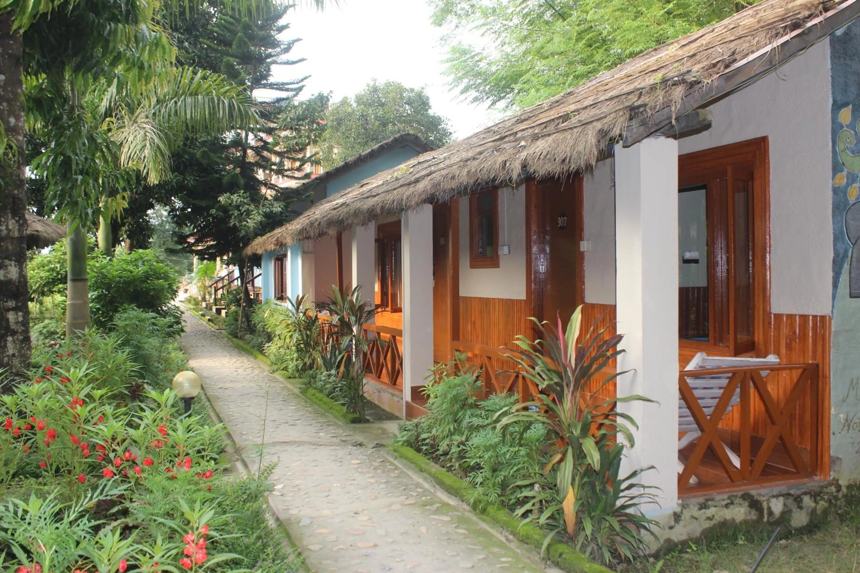 Garden in Chitwan Forest Resort with swimming pool , Chitwan National Park