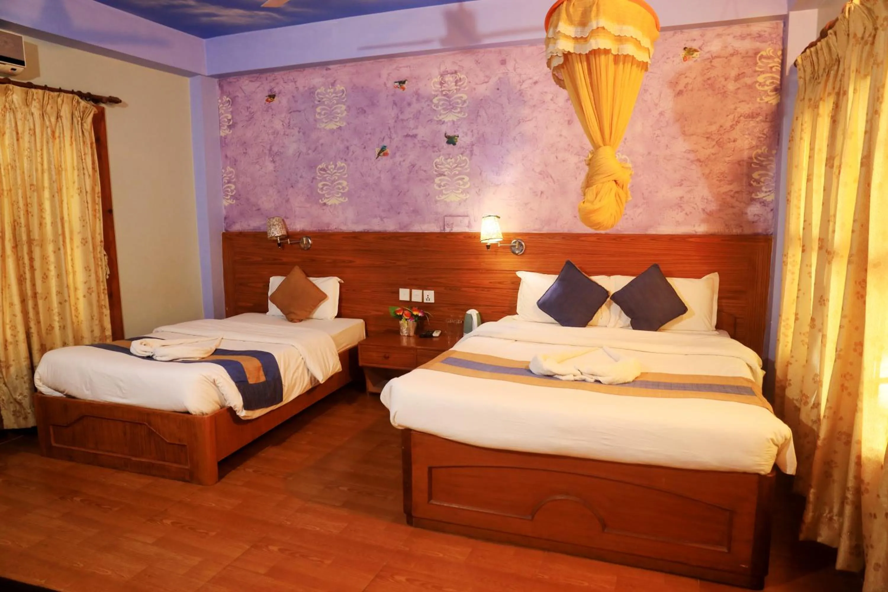 Bedroom, Bed in Chitwan Forest Resort with swimming pool , Chitwan National Park
