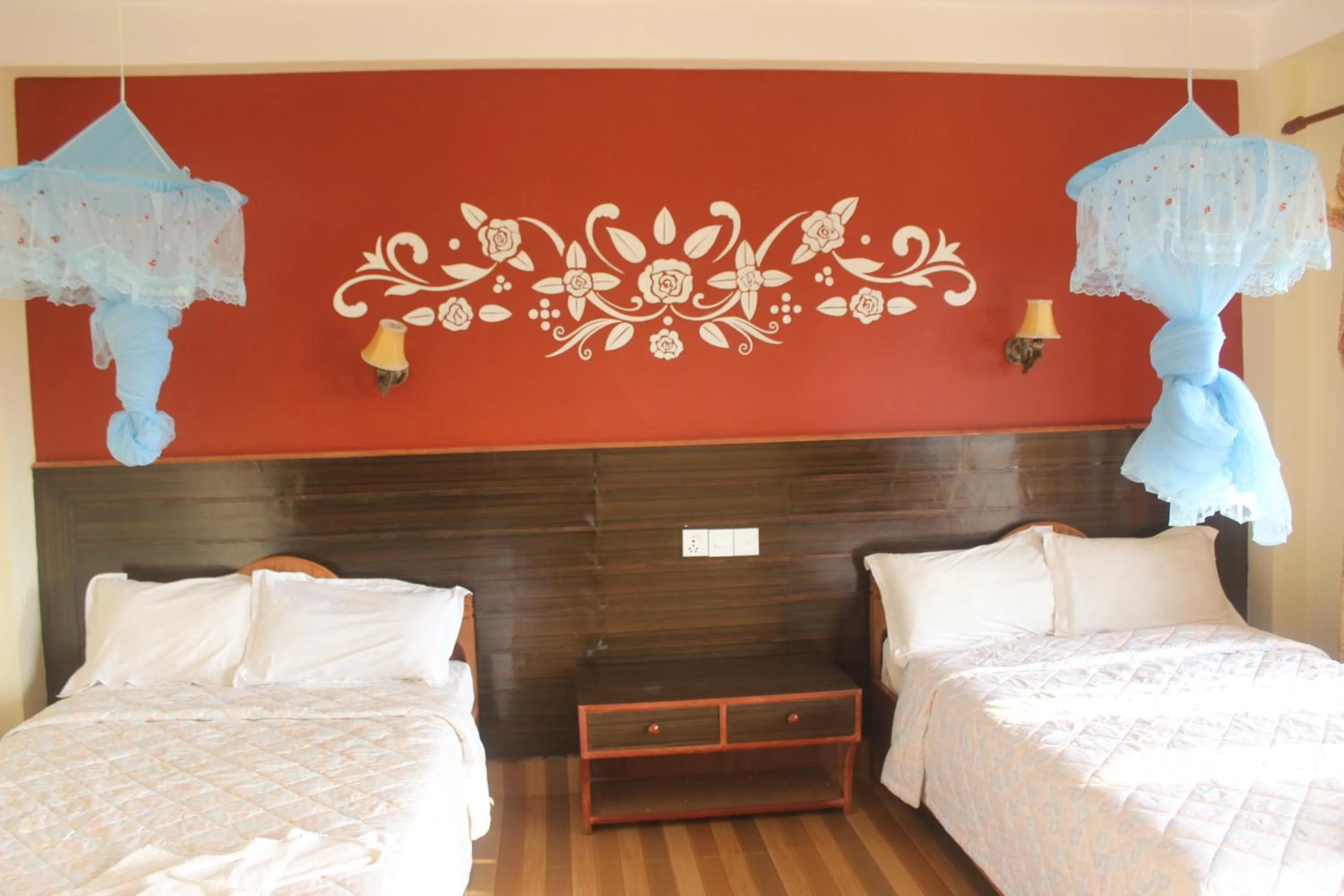 Bed in Chitwan Forest Resort with swimming pool , Chitwan National Park