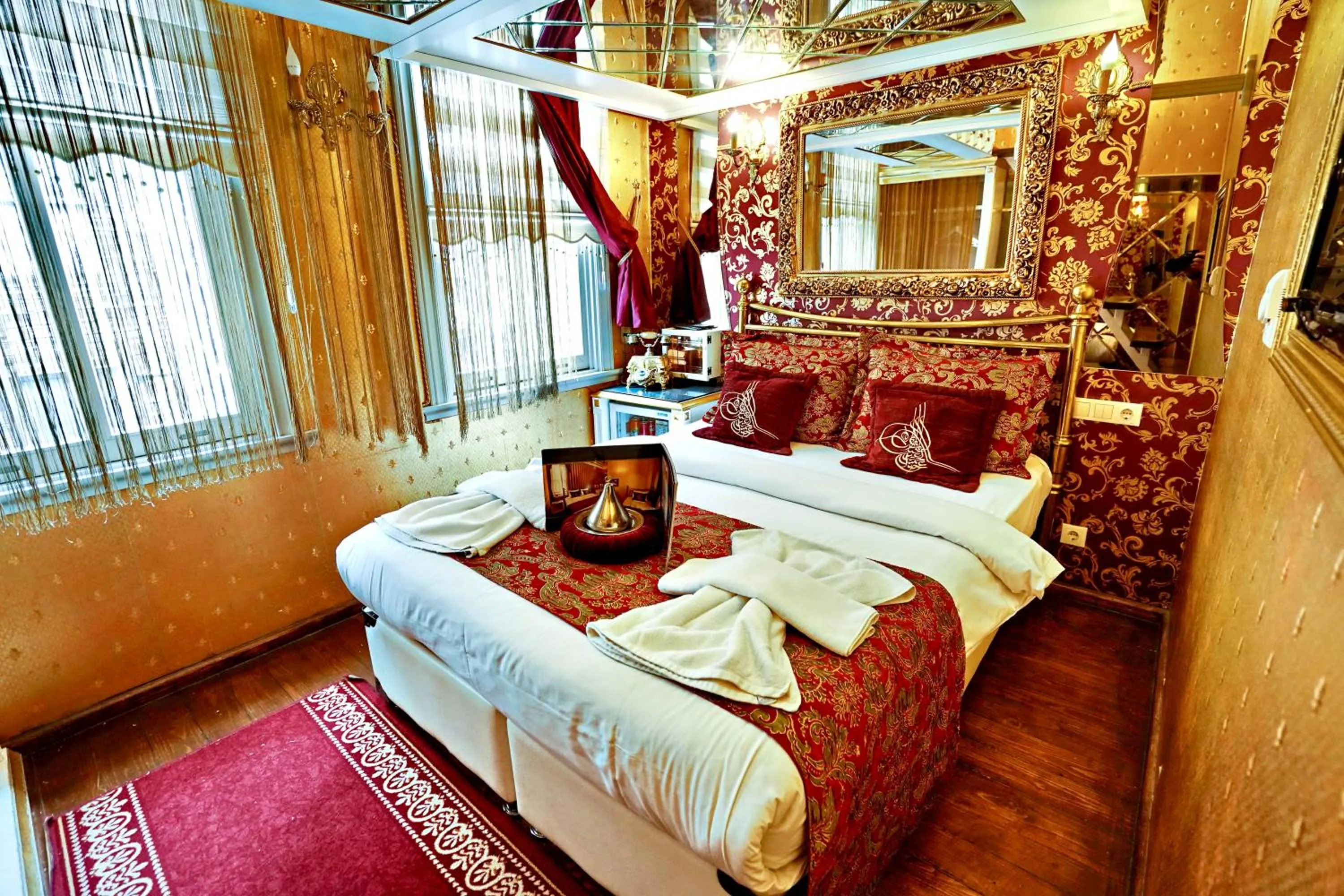 Photo of the whole room, Bed in Sultan Tughra Hotel