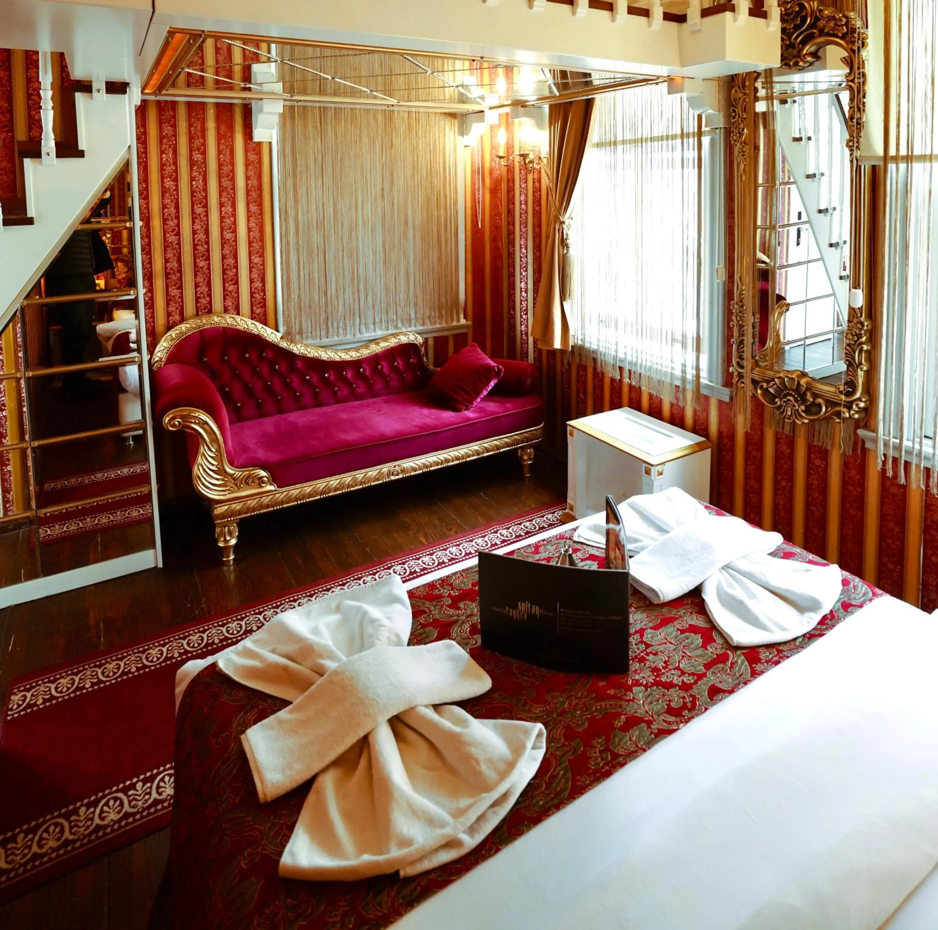 Living room, Bed in Sultan Tughra Hotel