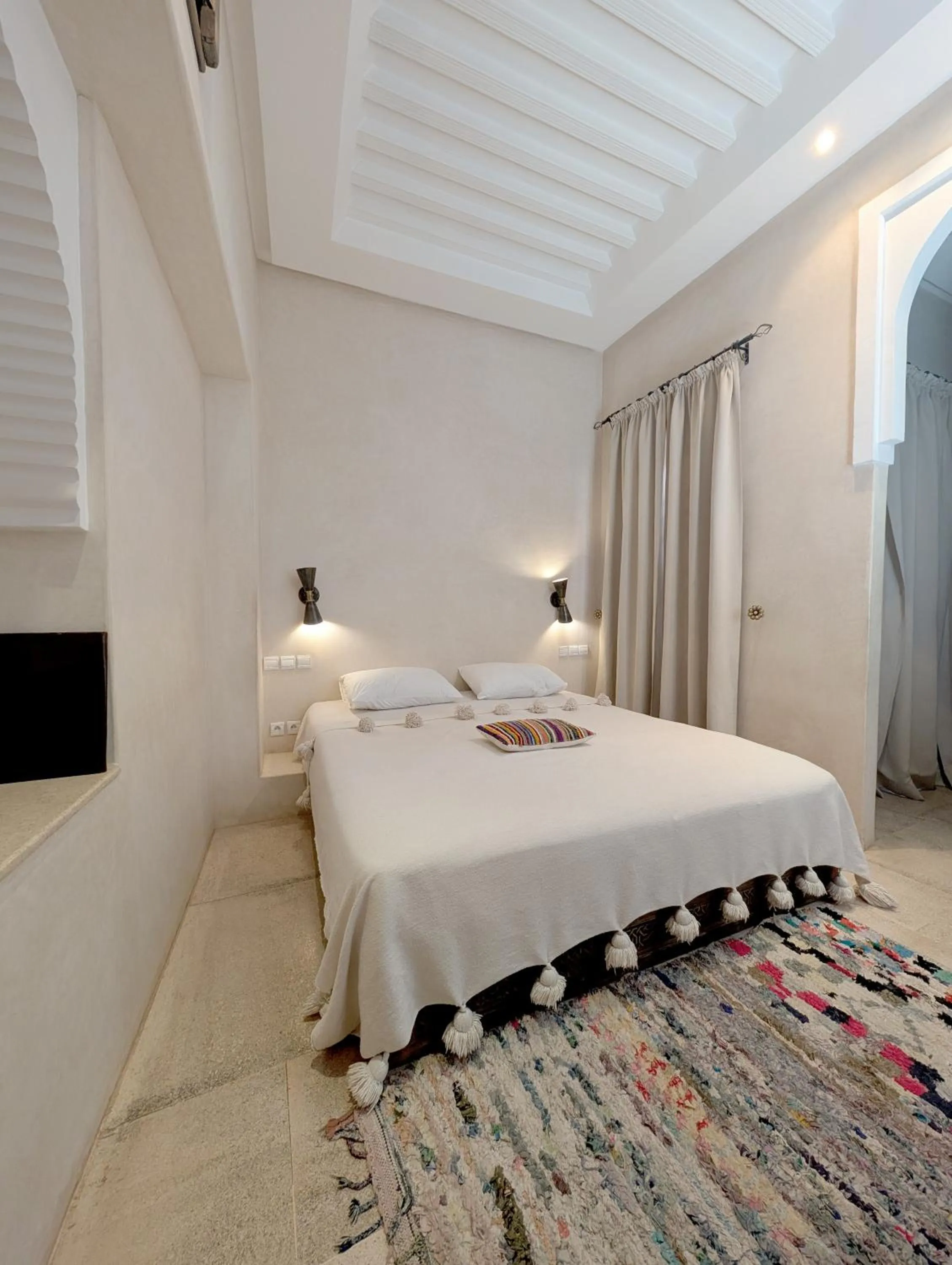 Bed in Riad Slitine & Spa
