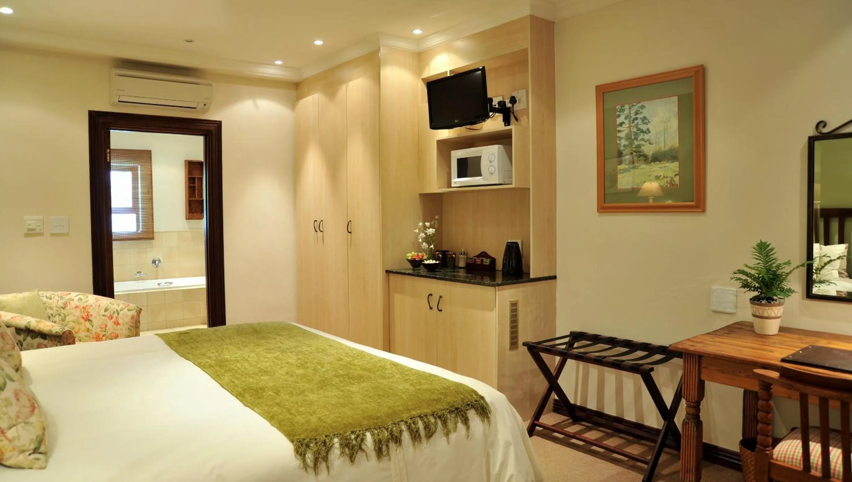 Bathroom, Bed in Claires of Sandton Luxury Guest House