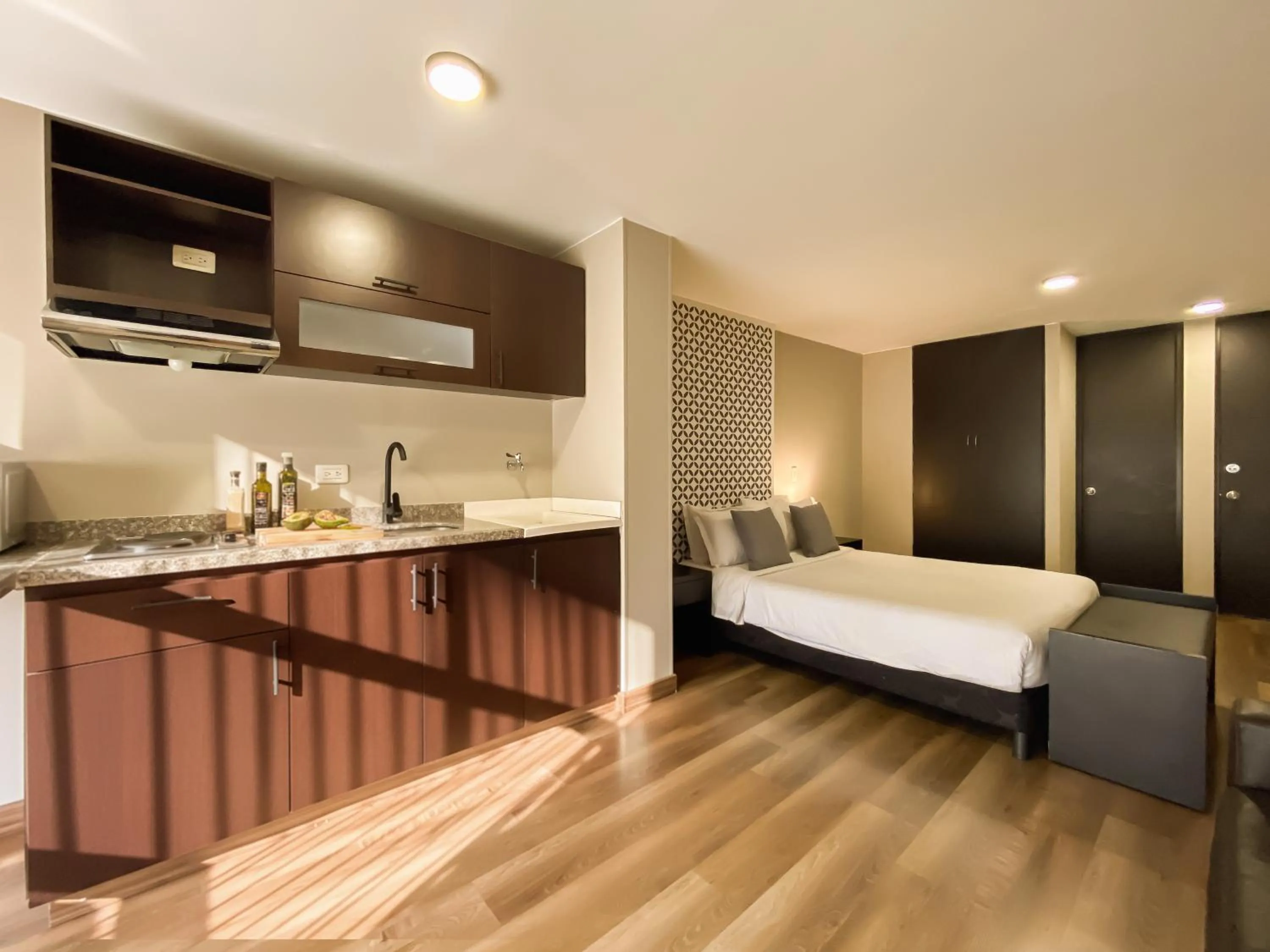 kitchen, Bed in Hemma Bogotá Chapinero Premium Suites Hotel