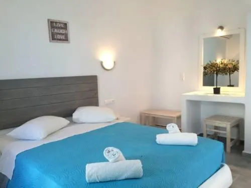 Bed in Anemos Hotel & Apartments