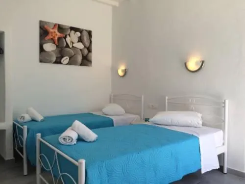 Bed in Anemos Hotel & Apartments