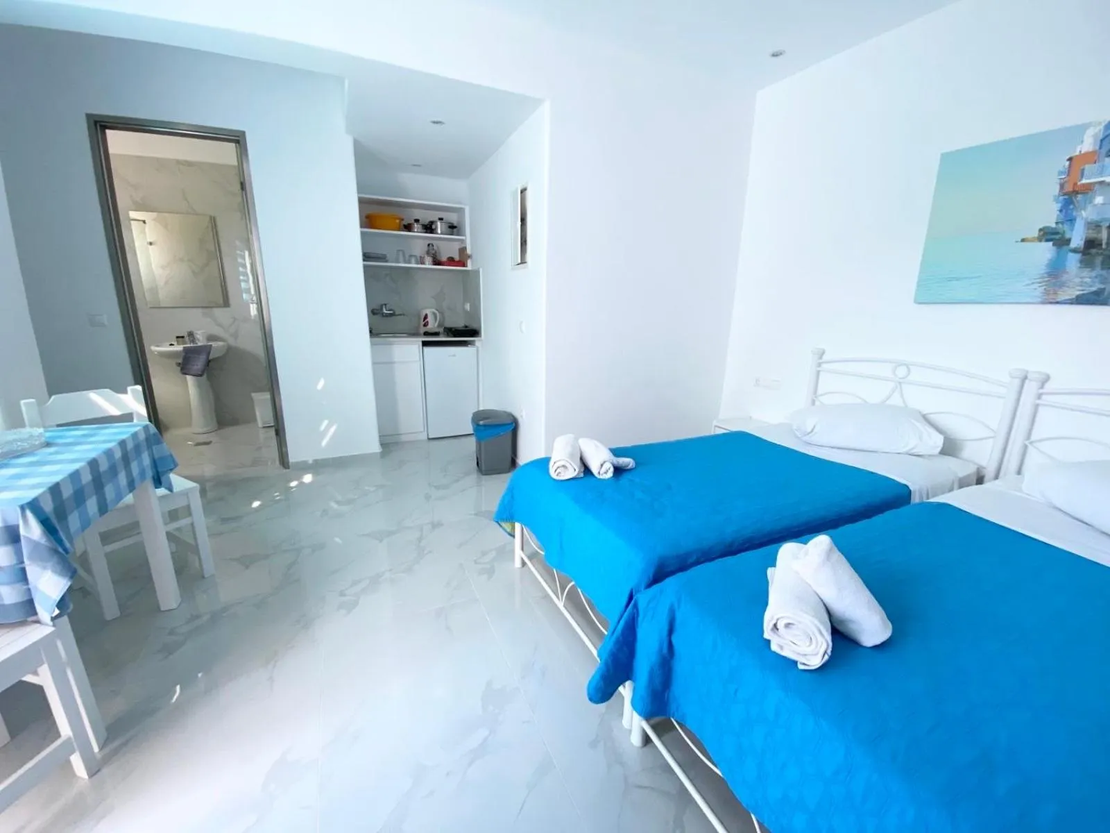 Bed in Anemos Hotel & Apartments