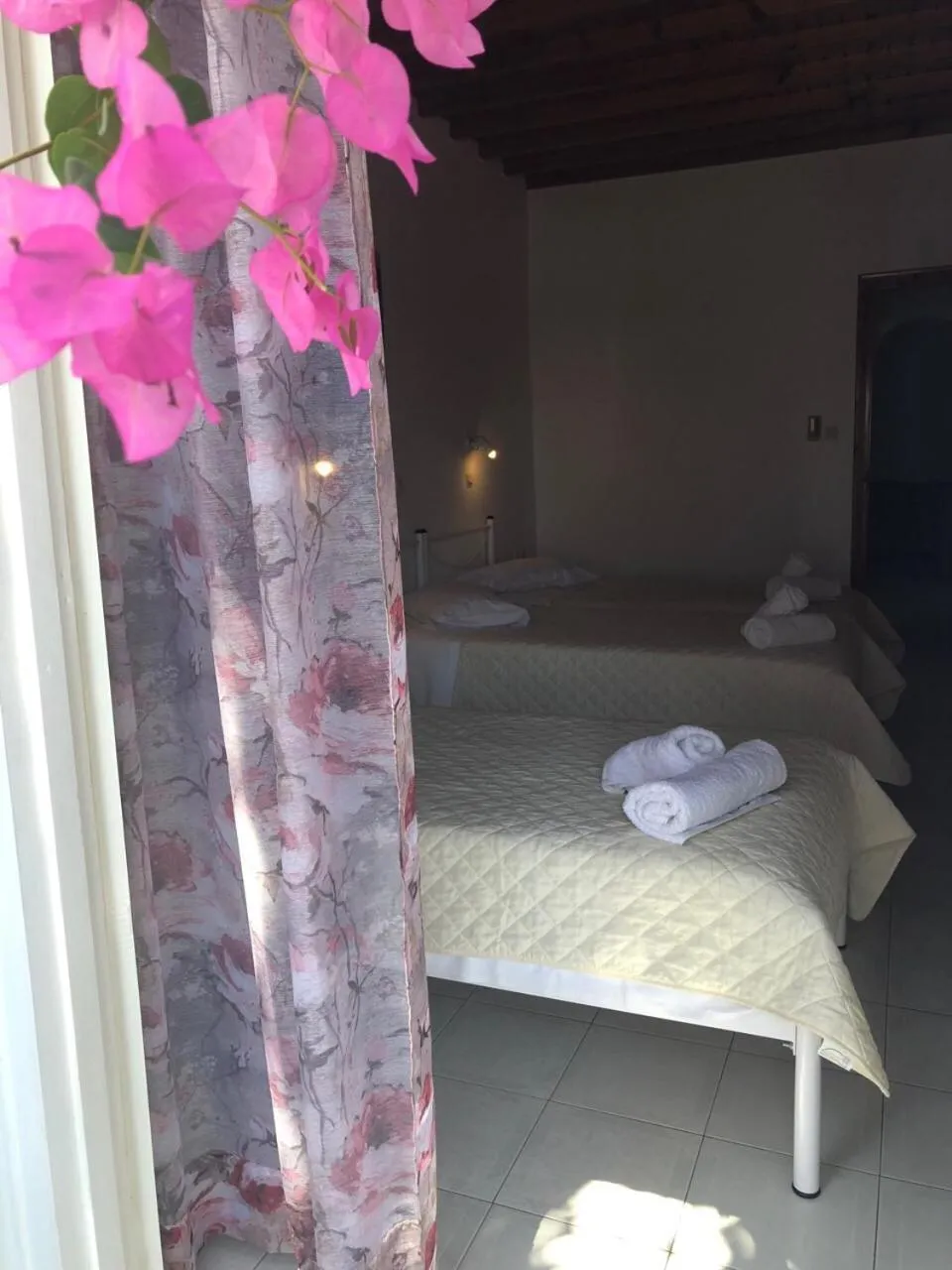 Bed in Anemos Hotel & Apartments