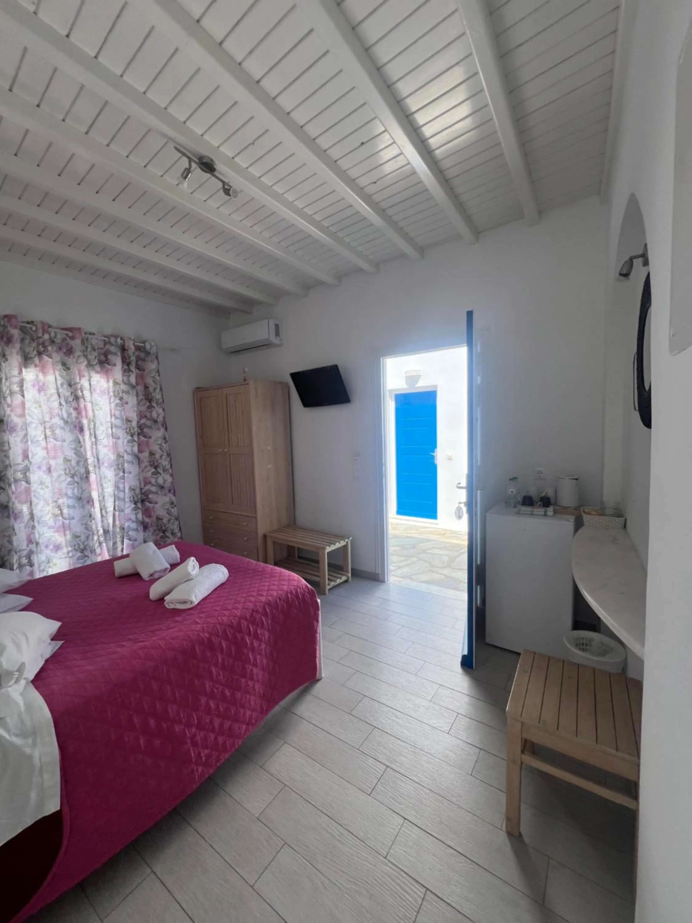 Bed in Anemos Hotel & Apartments