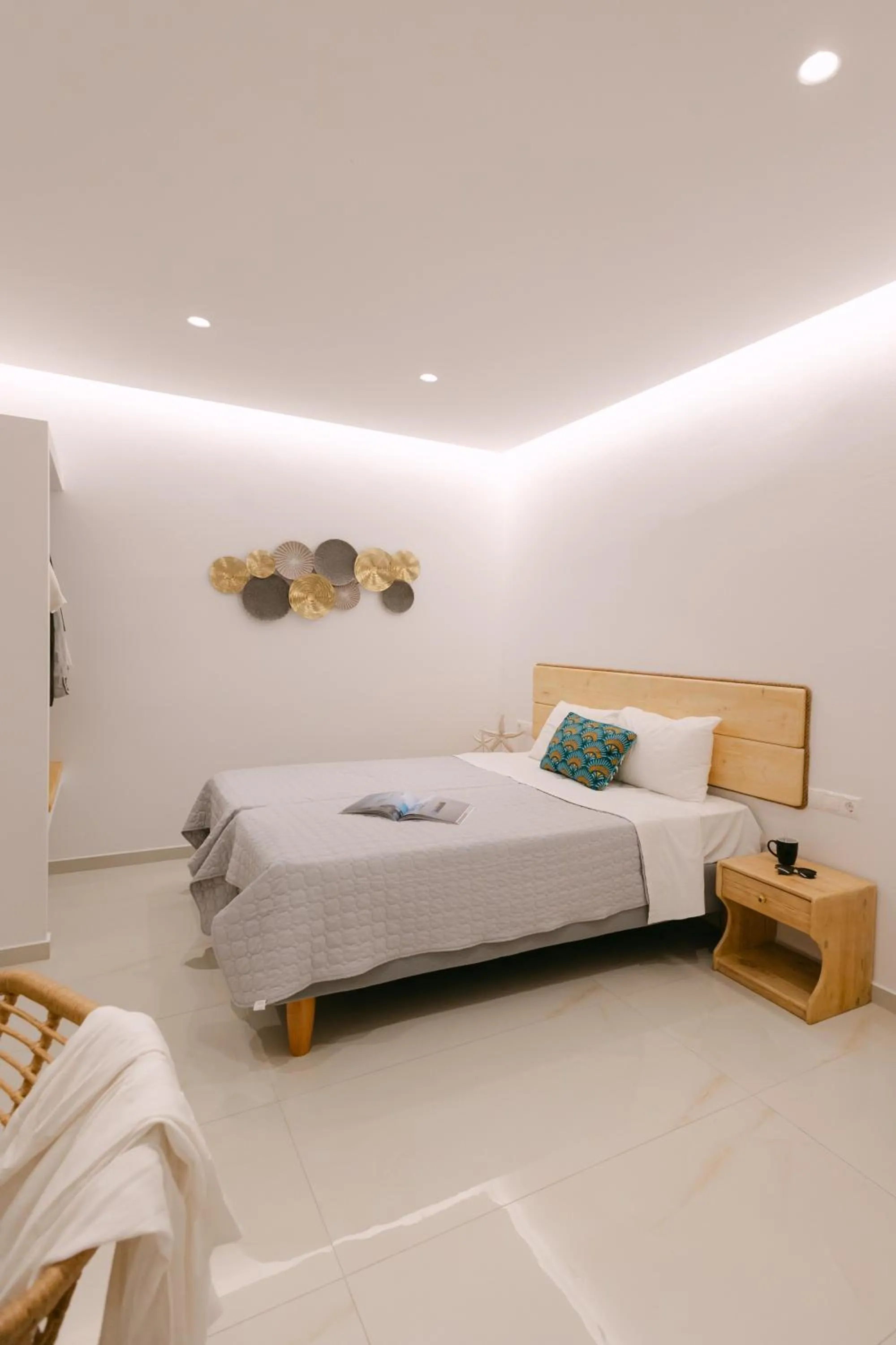 Bed in Anemos Hotel & Apartments