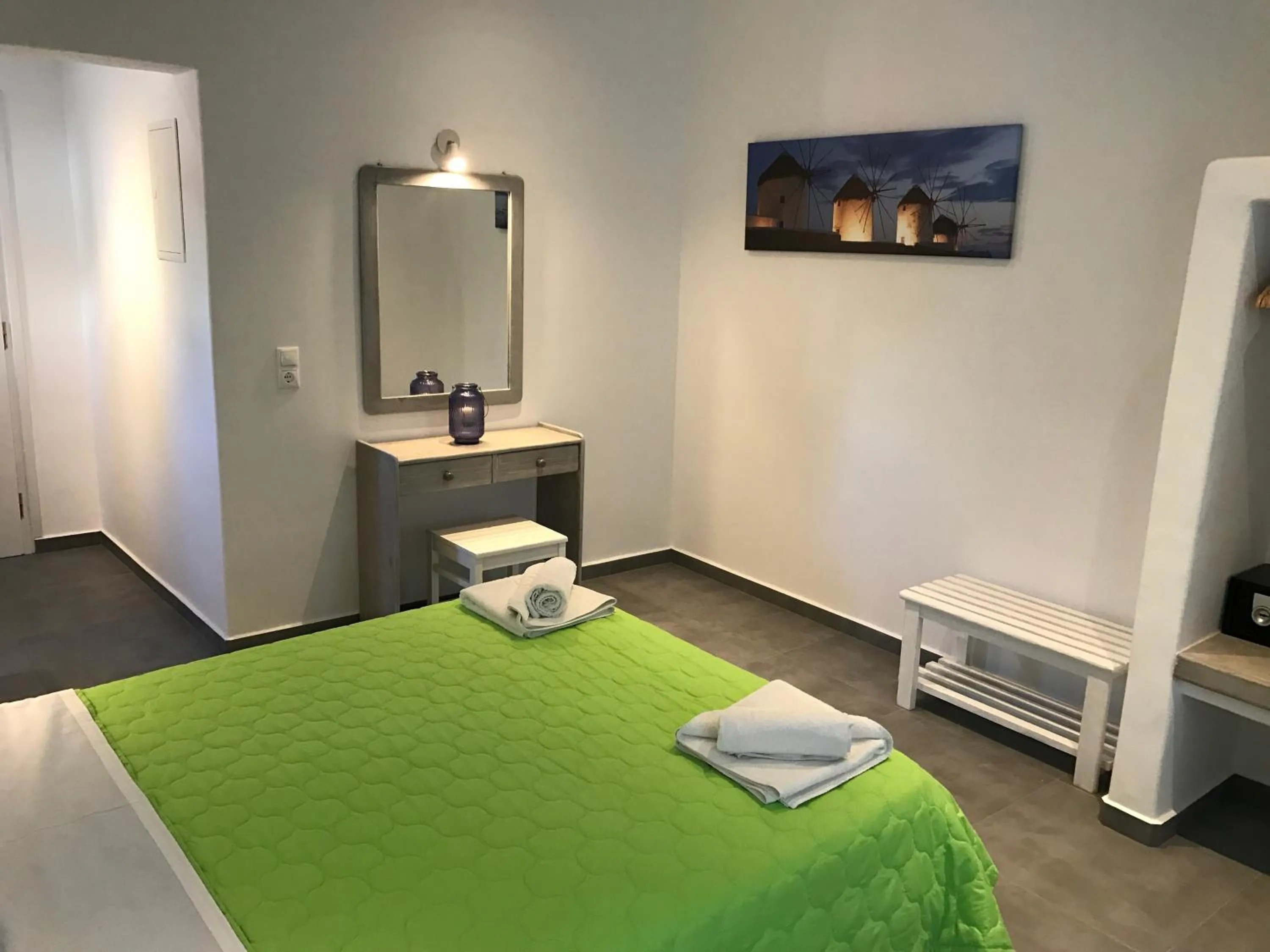 Bed in Anemos Hotel & Apartments