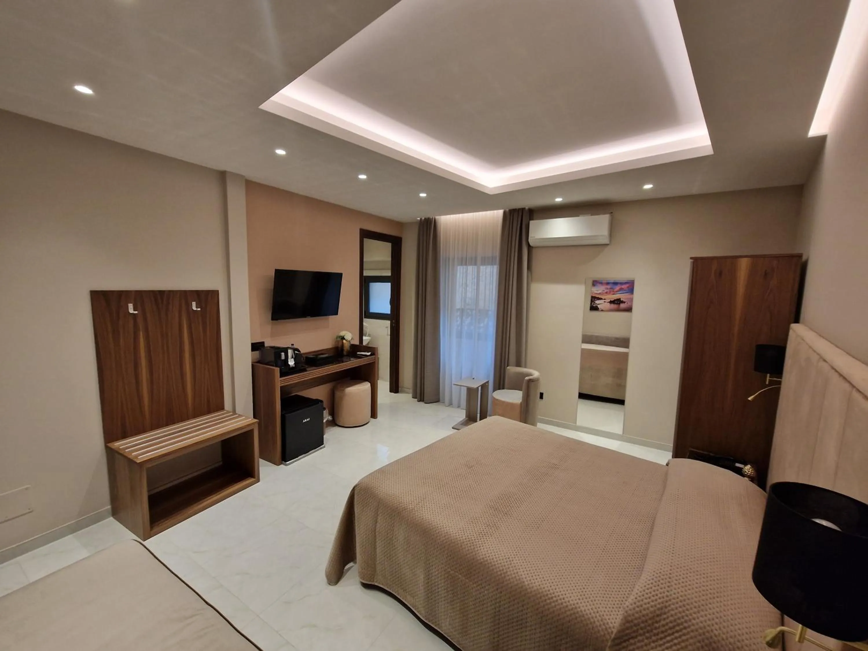 Bed in Beatus Suites And Rooms B&B