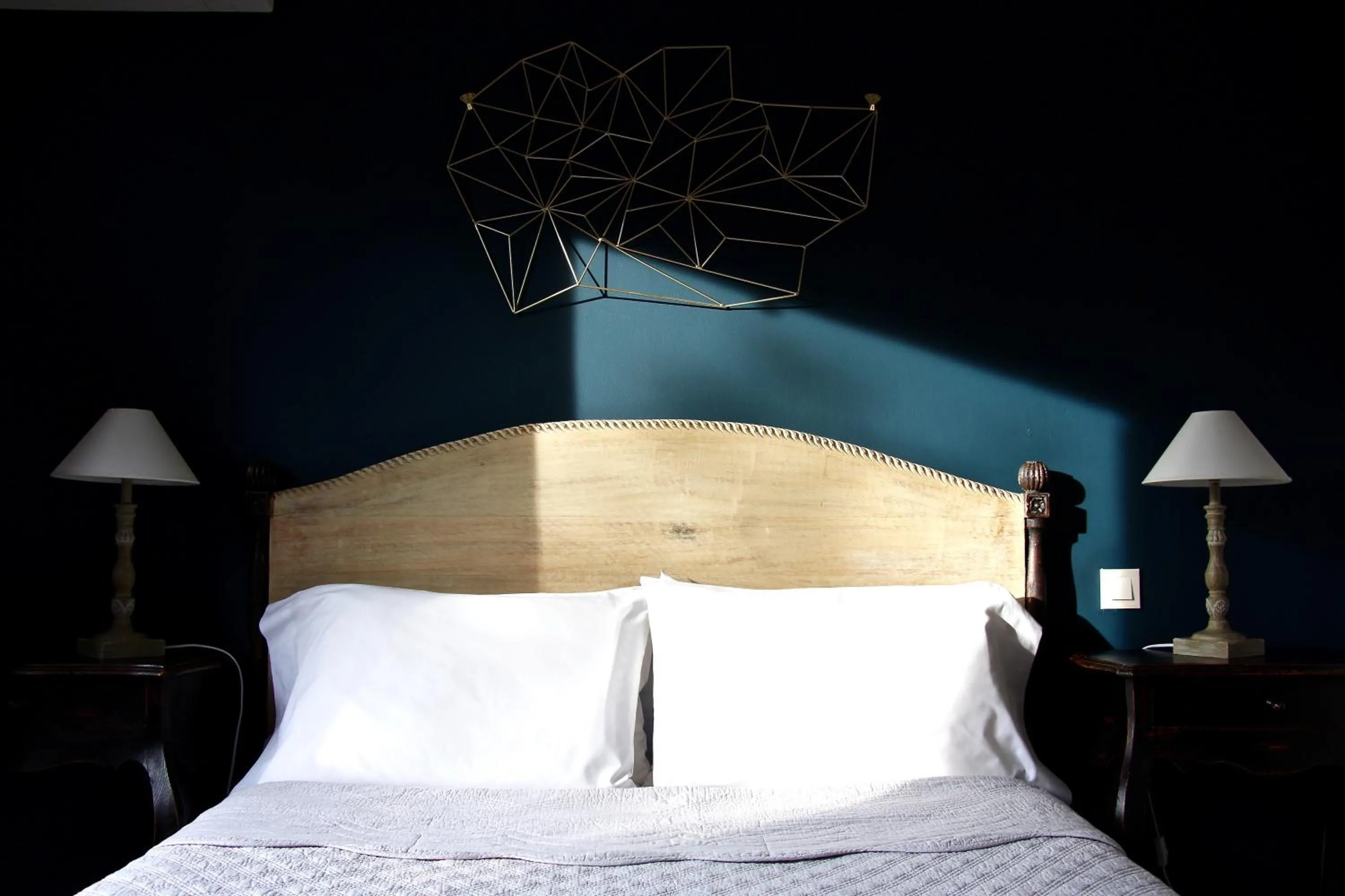 Bed in Hotel Les Oliviers