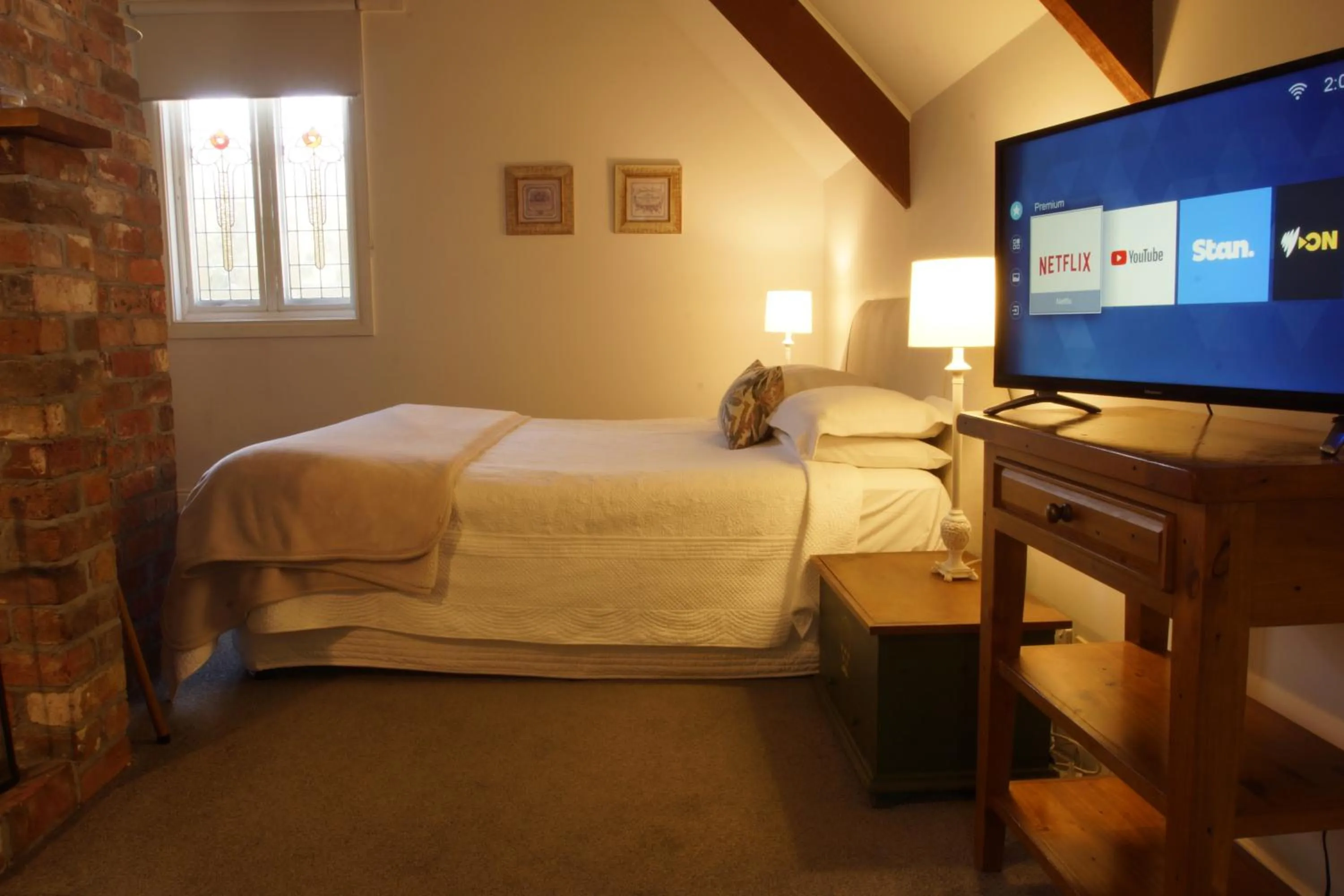 Bed in The Carriages Boutique Hotel and Vineyard