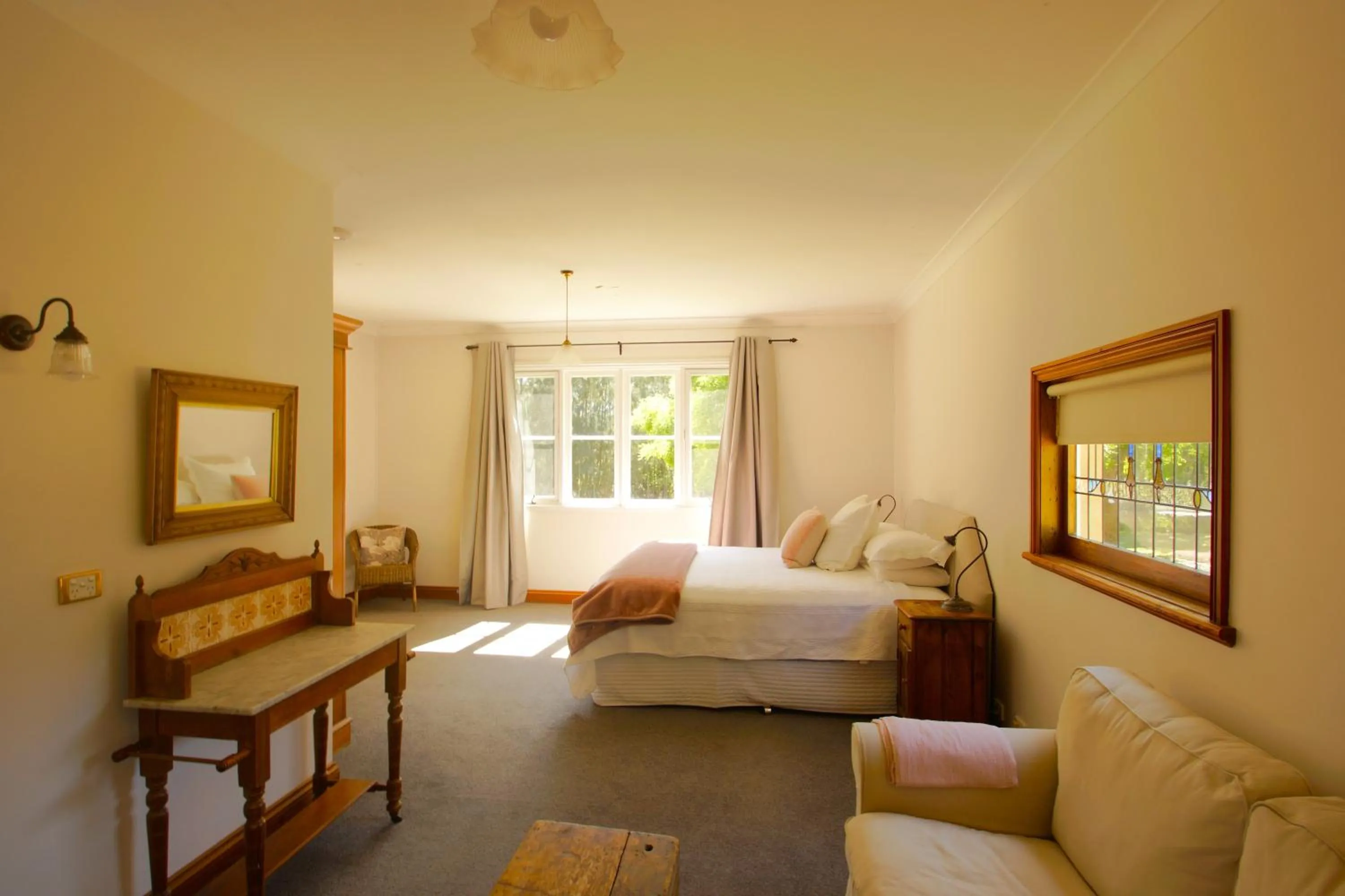 Bed in The Carriages Boutique Hotel and Vineyard