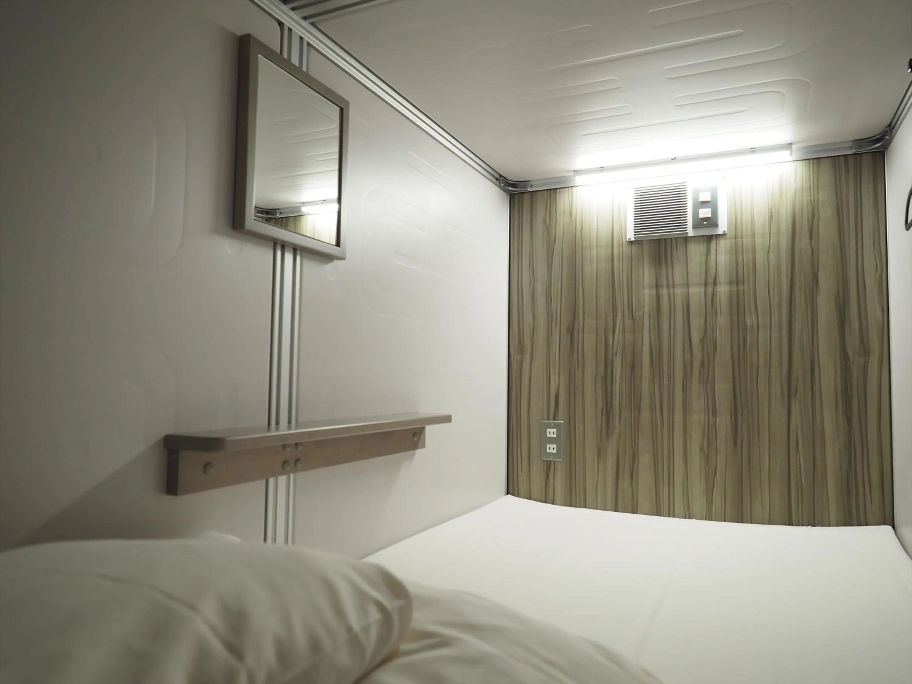 Photo of the whole room, Bed in LEO YU Capsule Hotel Nishifunabashi