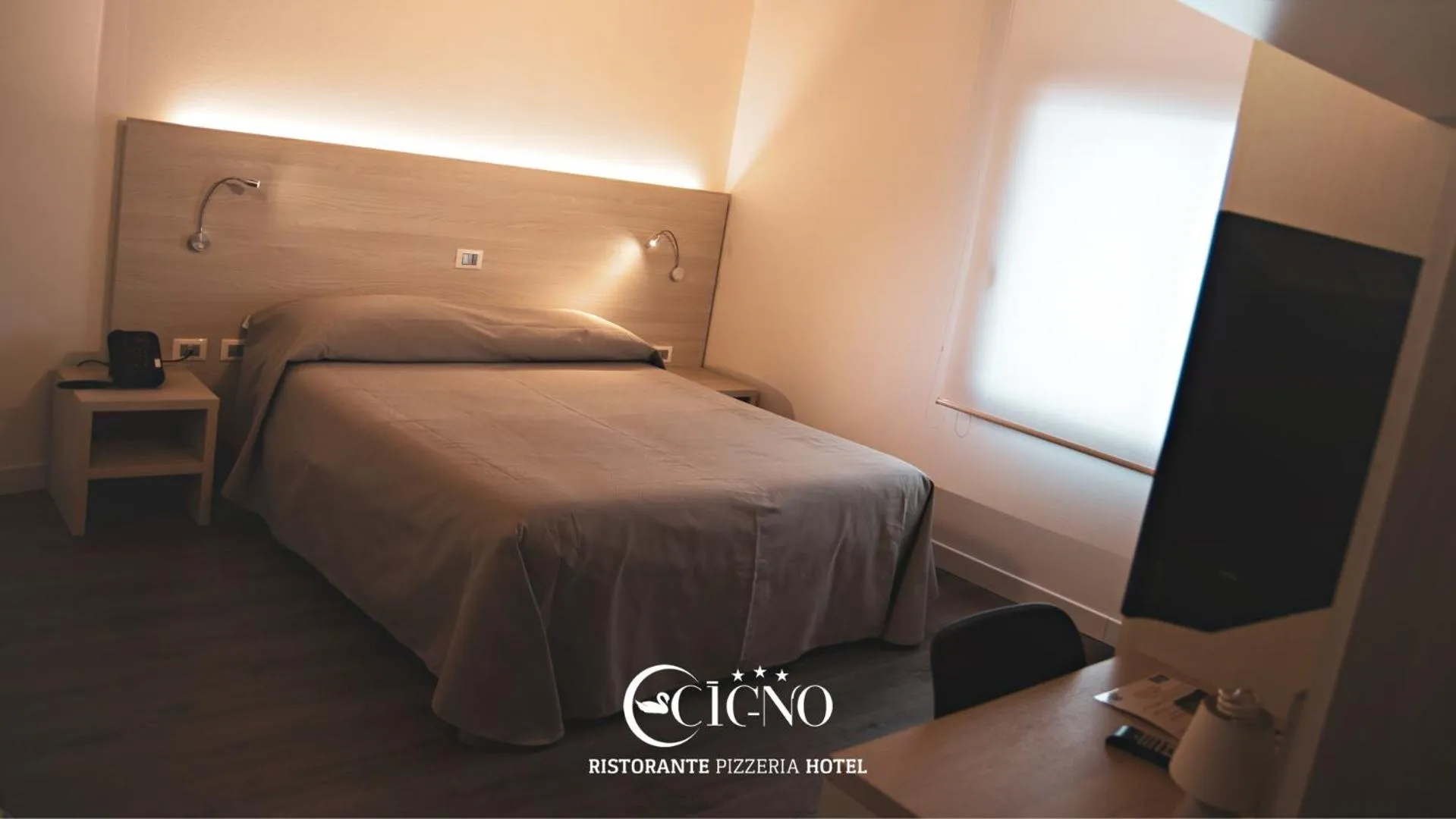 Bed in Hotel Ristorante Cigno - Camere and Aparthotel