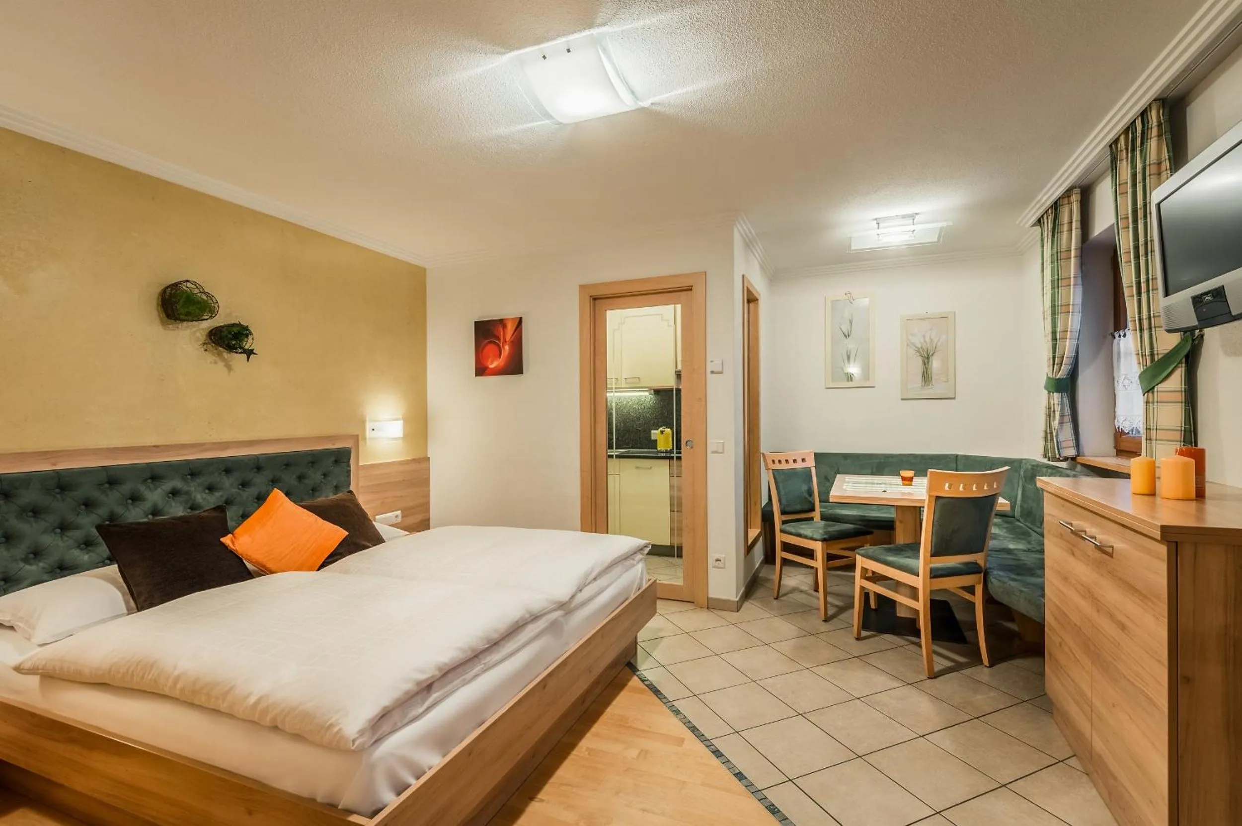 Living room, Bed in Taela Apartments