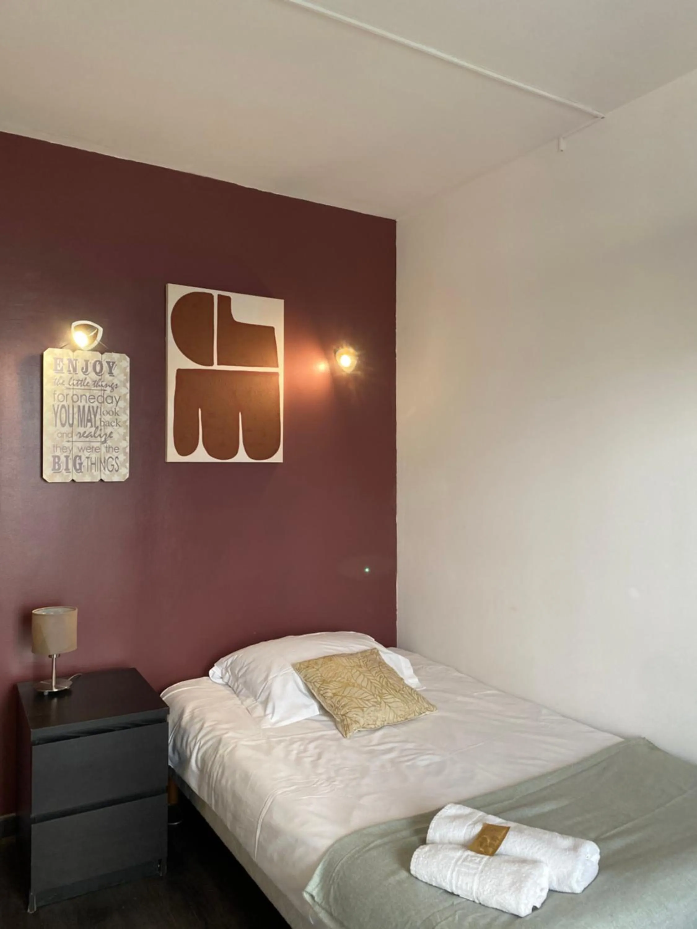 Bed in Hôtel des Beaux Arts