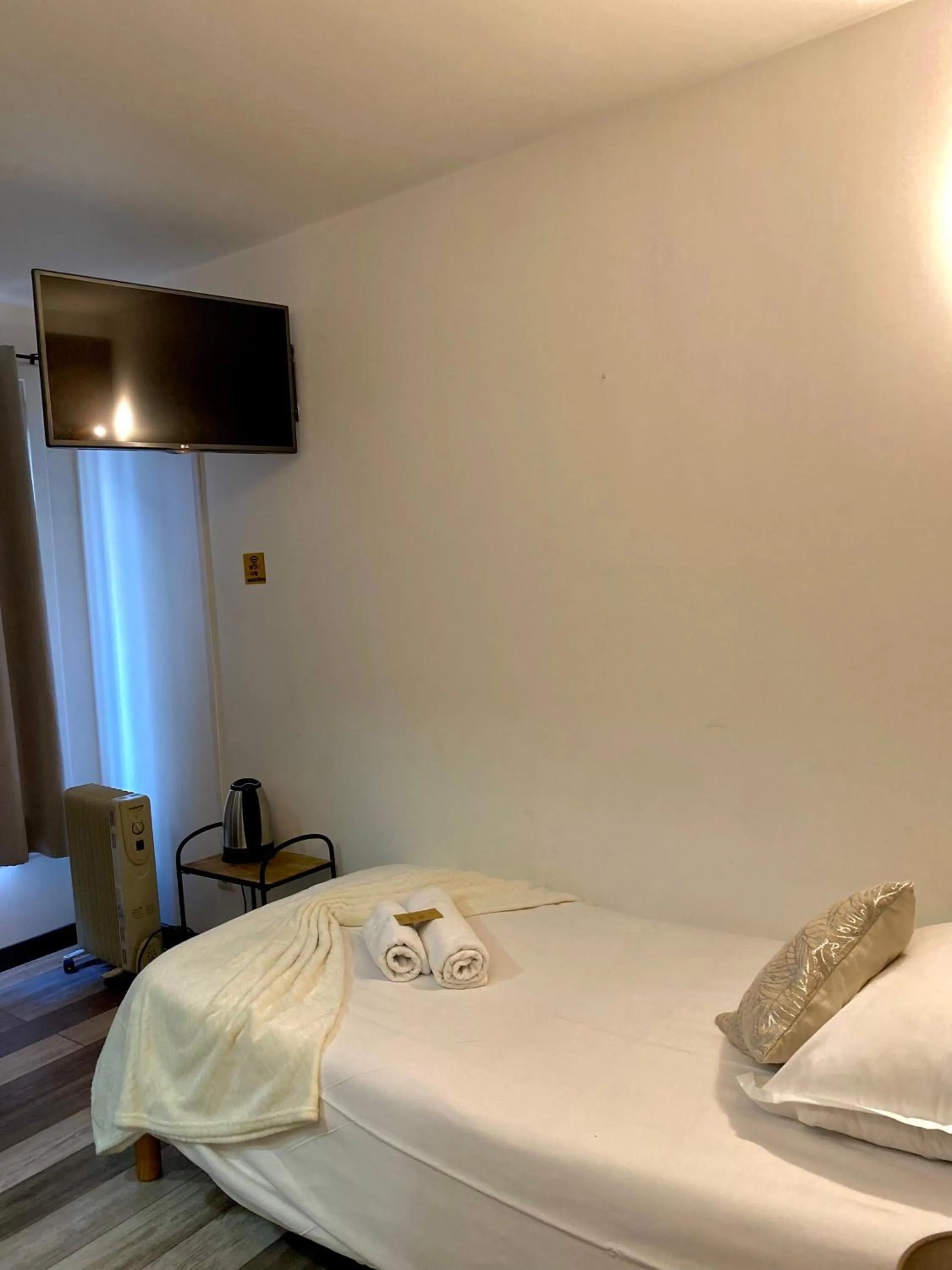 Bed in Hôtel des Beaux Arts