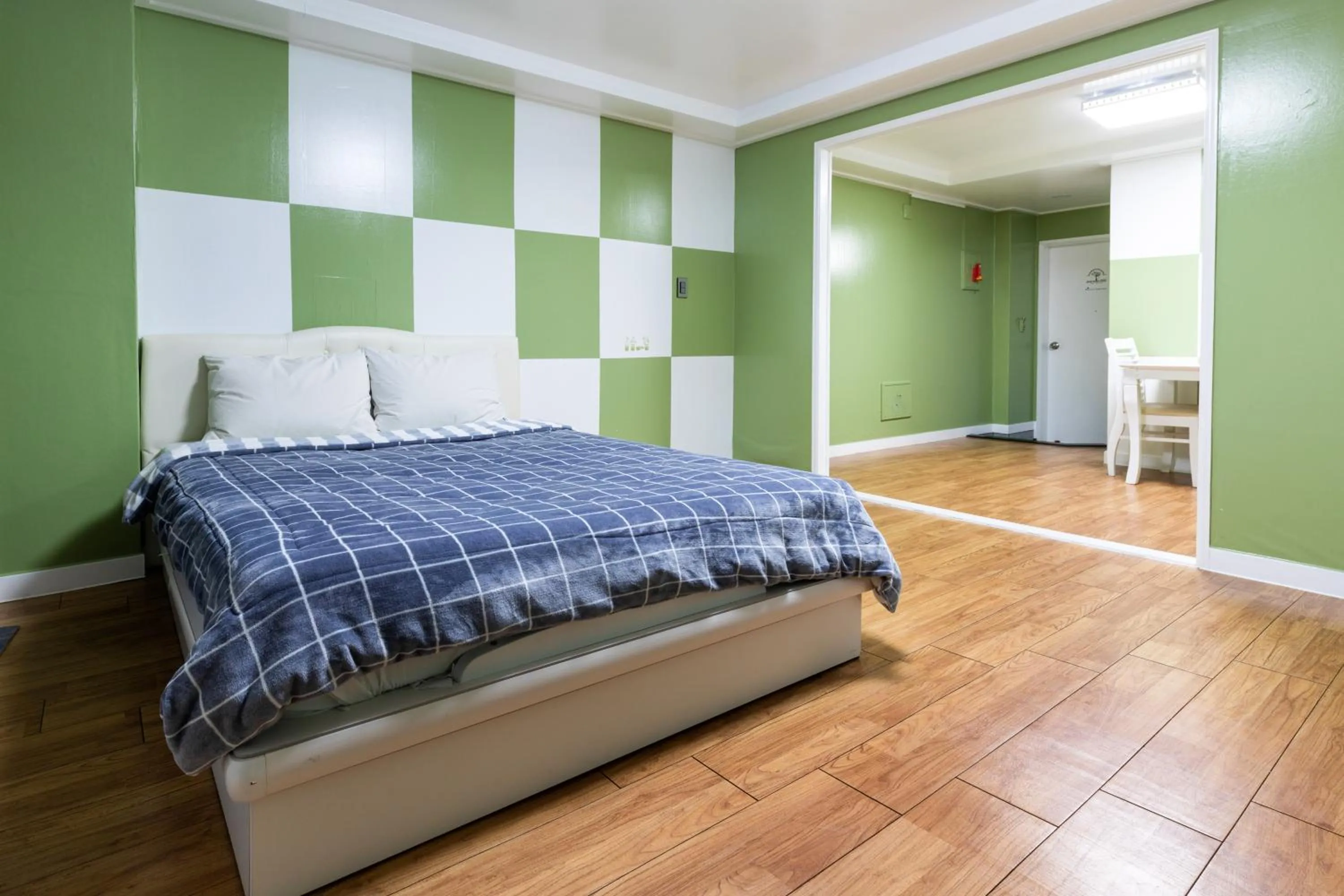 Bed in jeju Tovice Condo Ocean