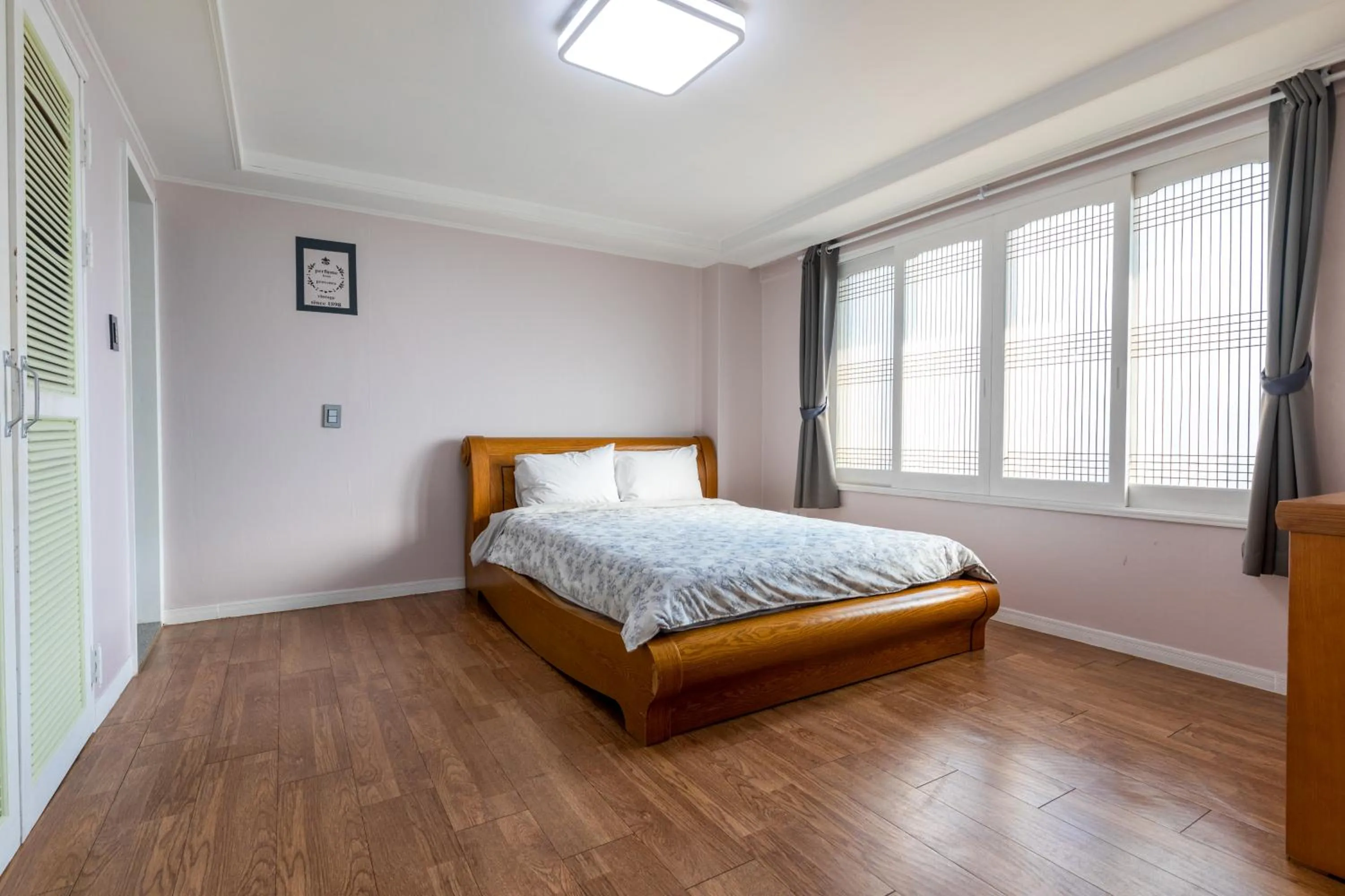 Bed in jeju Tovice Condo Ocean