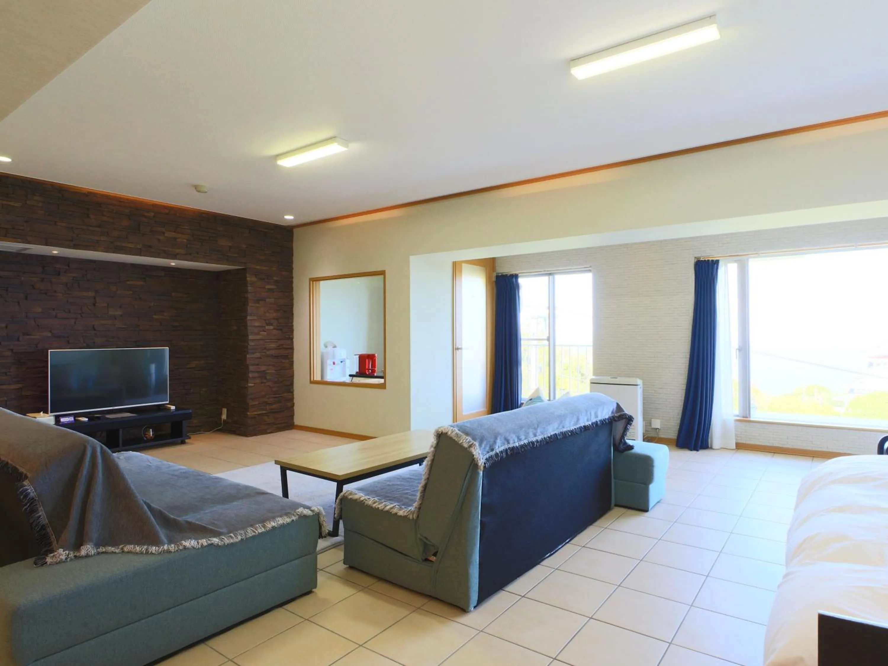 Photo of the whole room, Bed in Mujuan