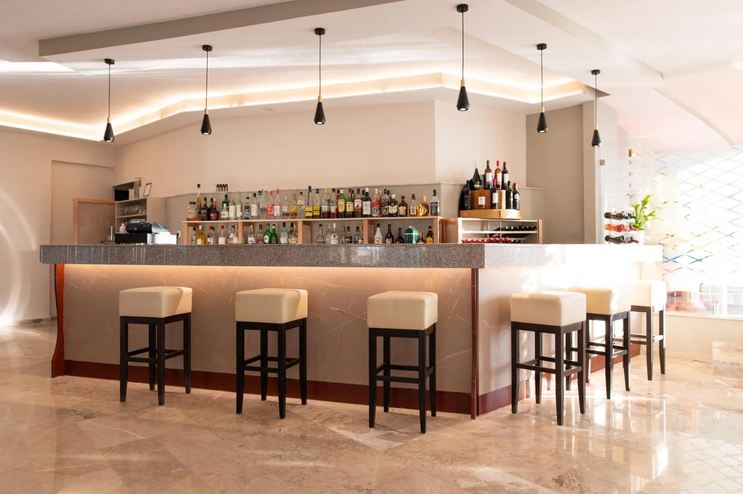 Lounge or bar in Costa Angela Seaside Resort