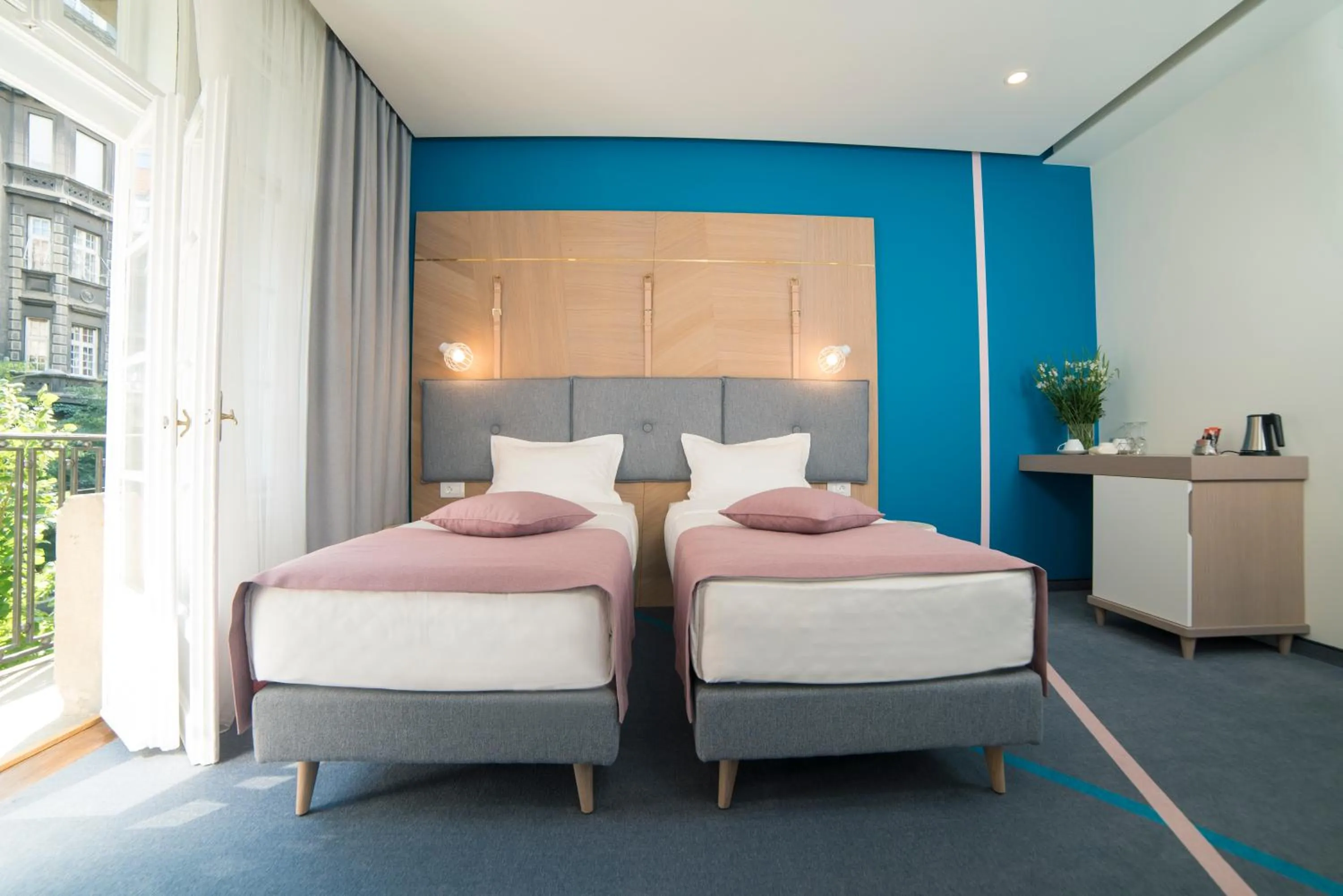 Bed in City Nest Modern & Cozy Suites