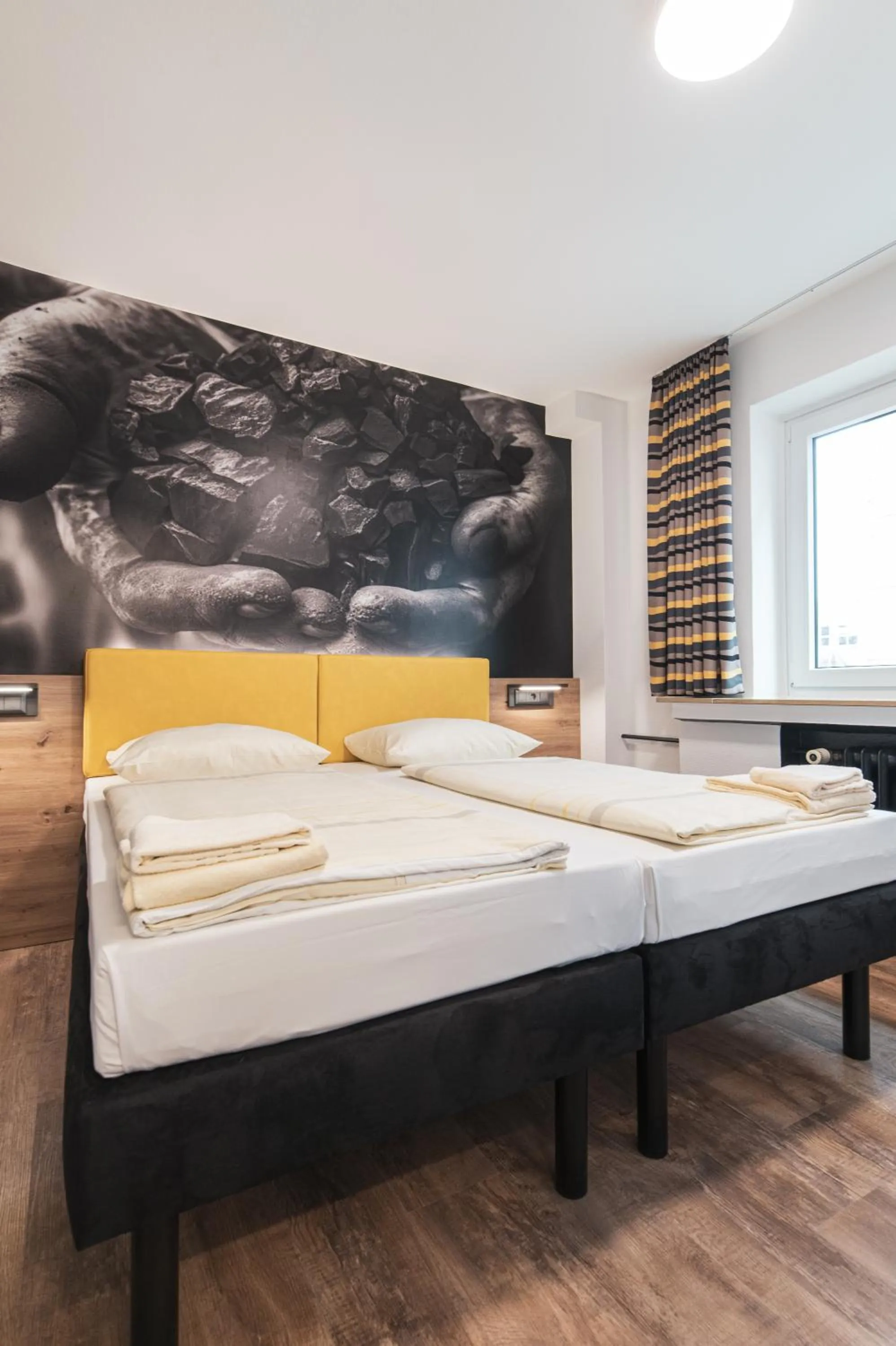 Photo of the whole room, Bed in DJH Jugendgästehaus Adolph Kolping