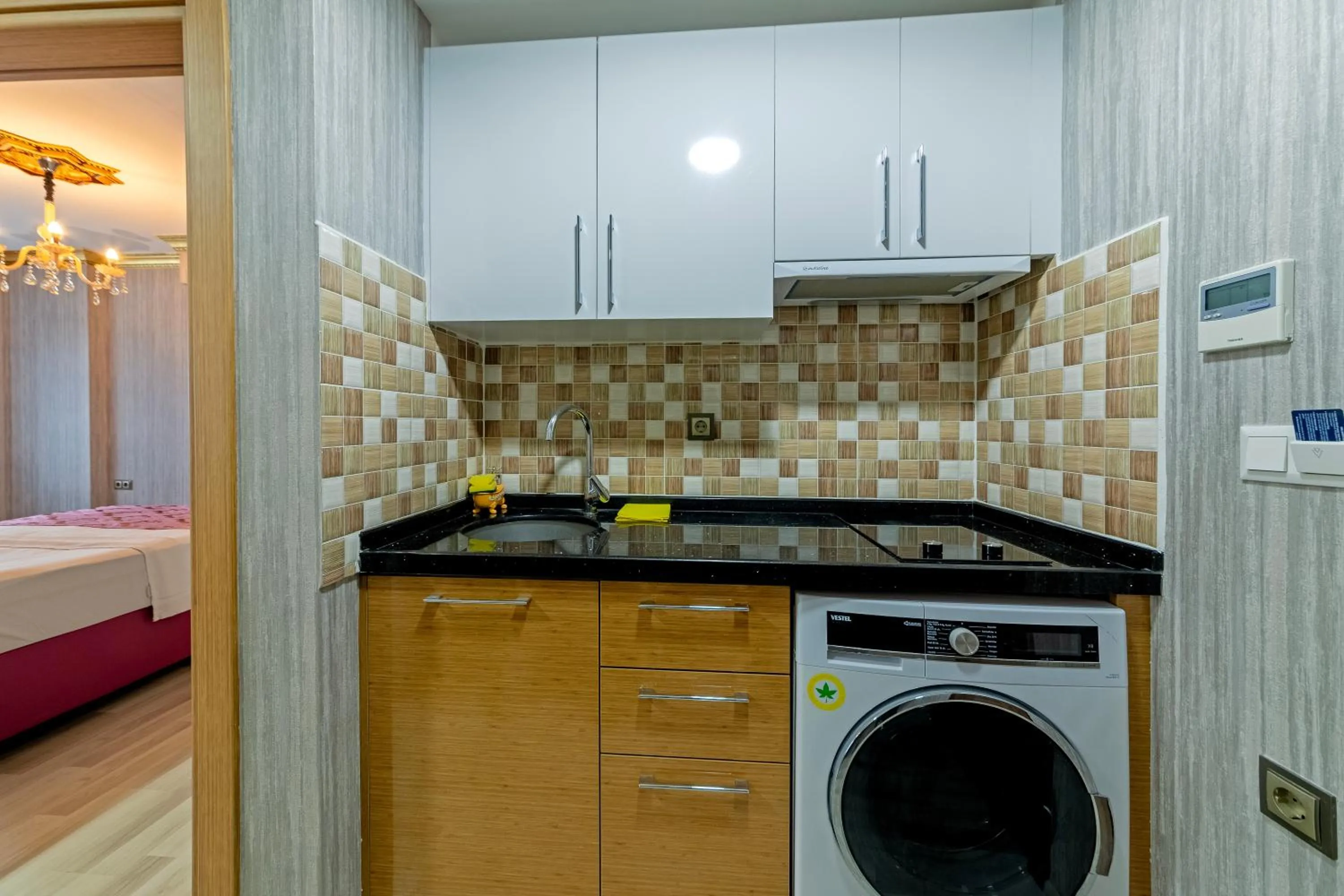 stove in Royal Babil Suites Hotel