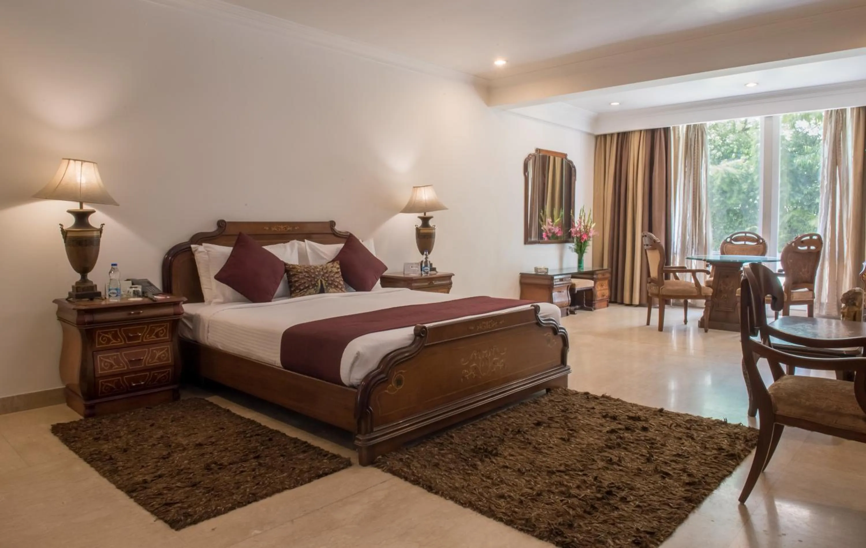 Garden view, Bed in Diplomat, Chanakyapuri New Delhi- A Boutique Hotel