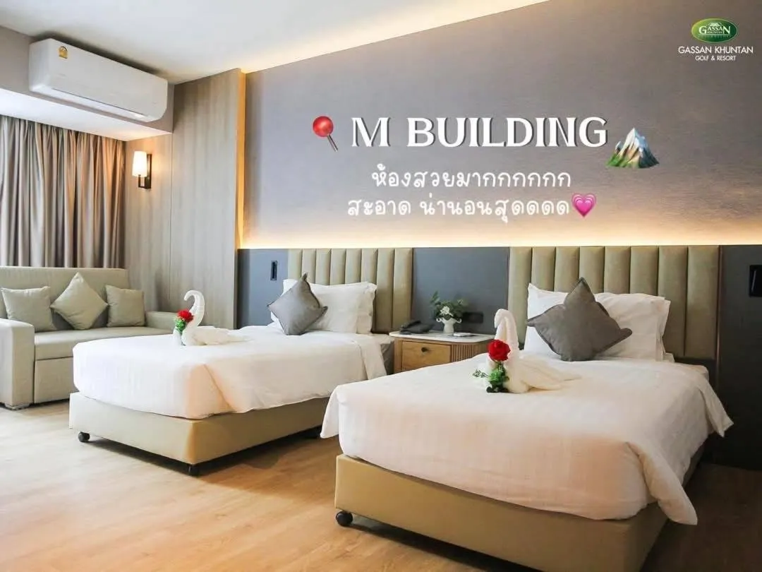 Bed in Gassan Khuntan Golf & Resort