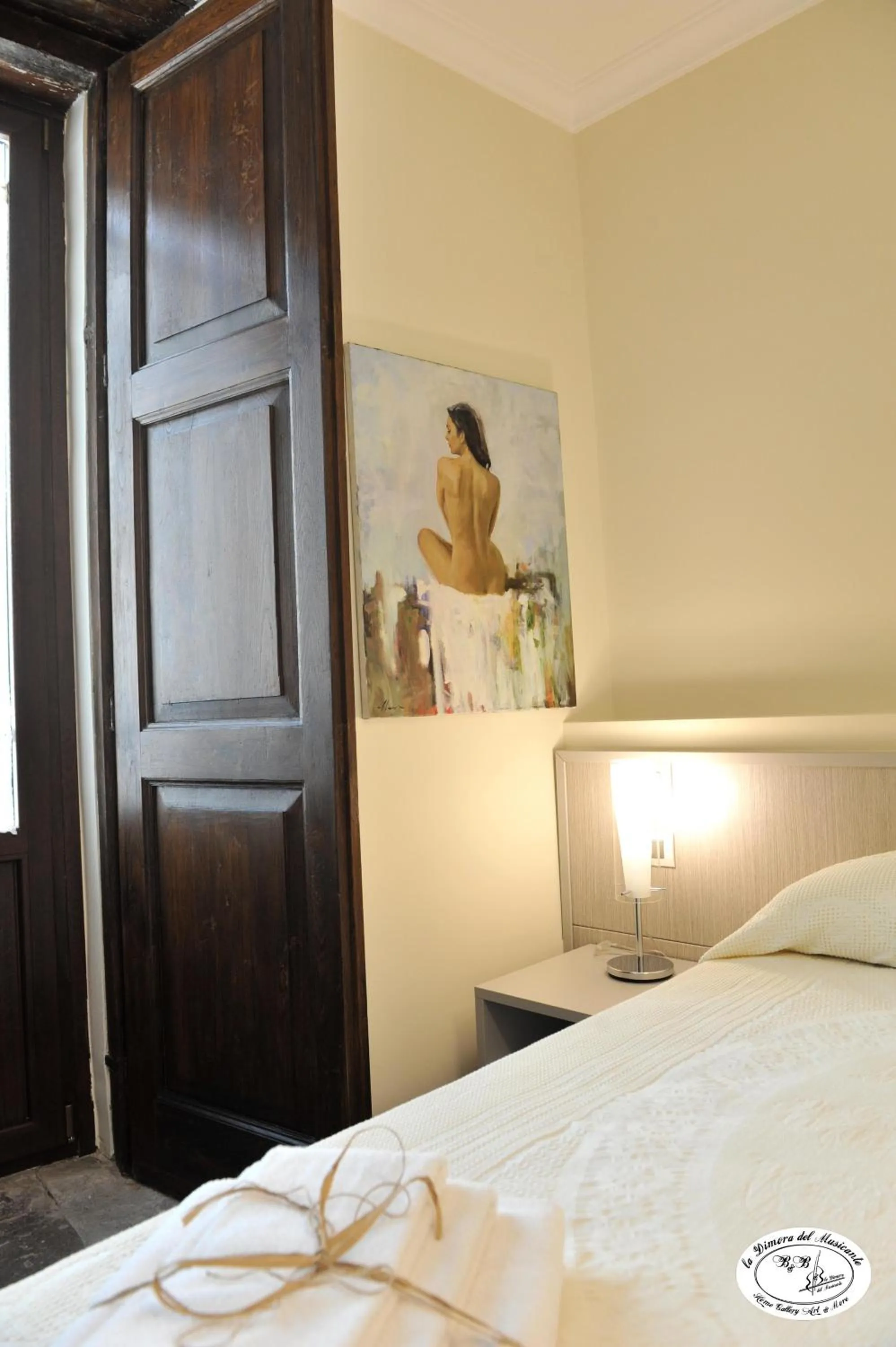 Bed in La Dimora del Musicante HomeGallery