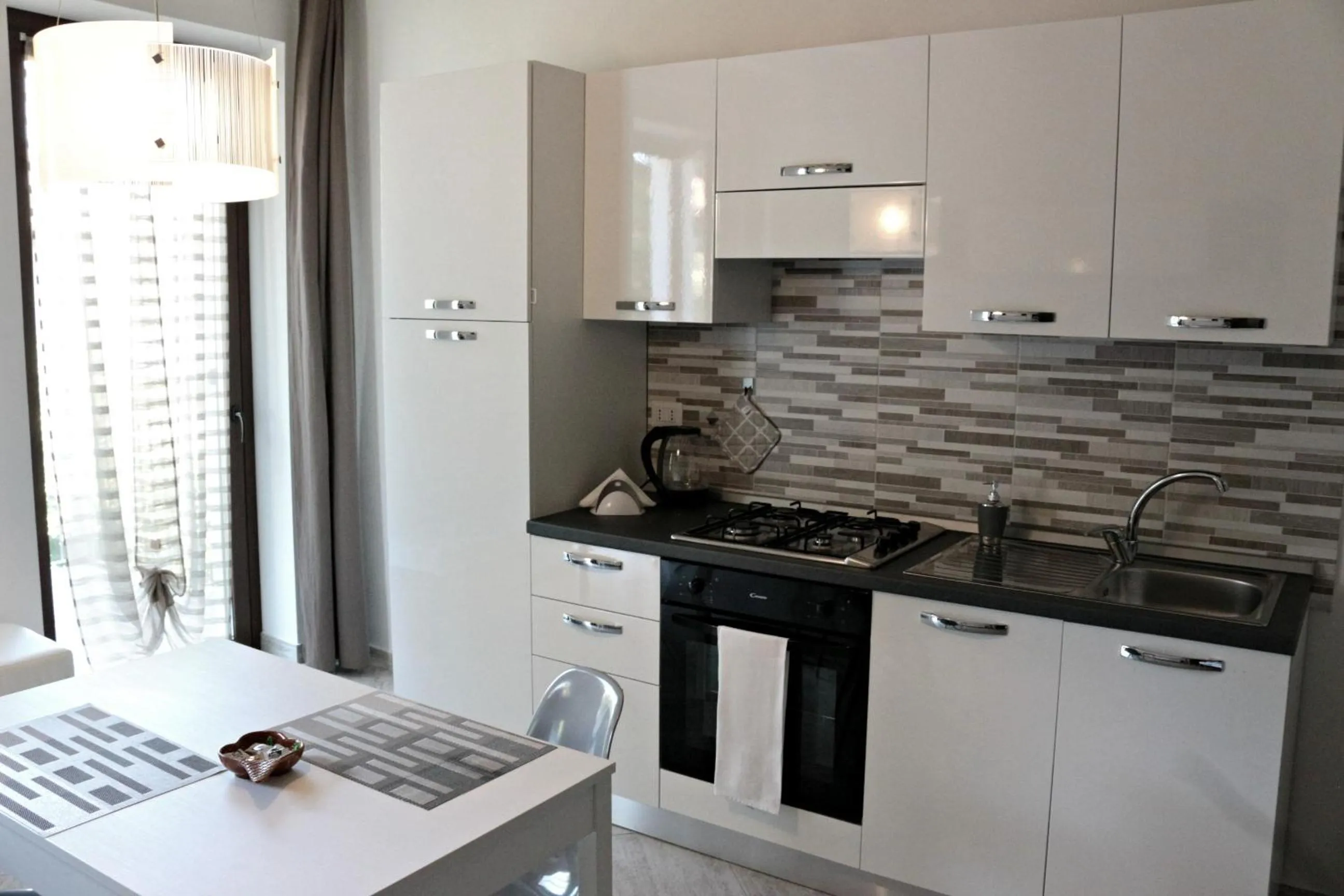 Kitchen or kitchenette in Paradeisos Residence Sas