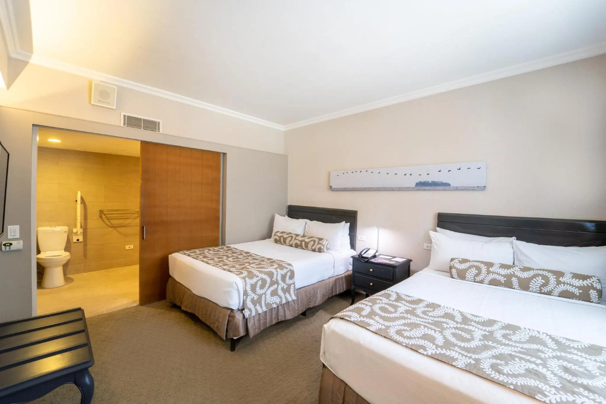 Photo of the whole room, Bed in Crowne Plaza Managua by IHG